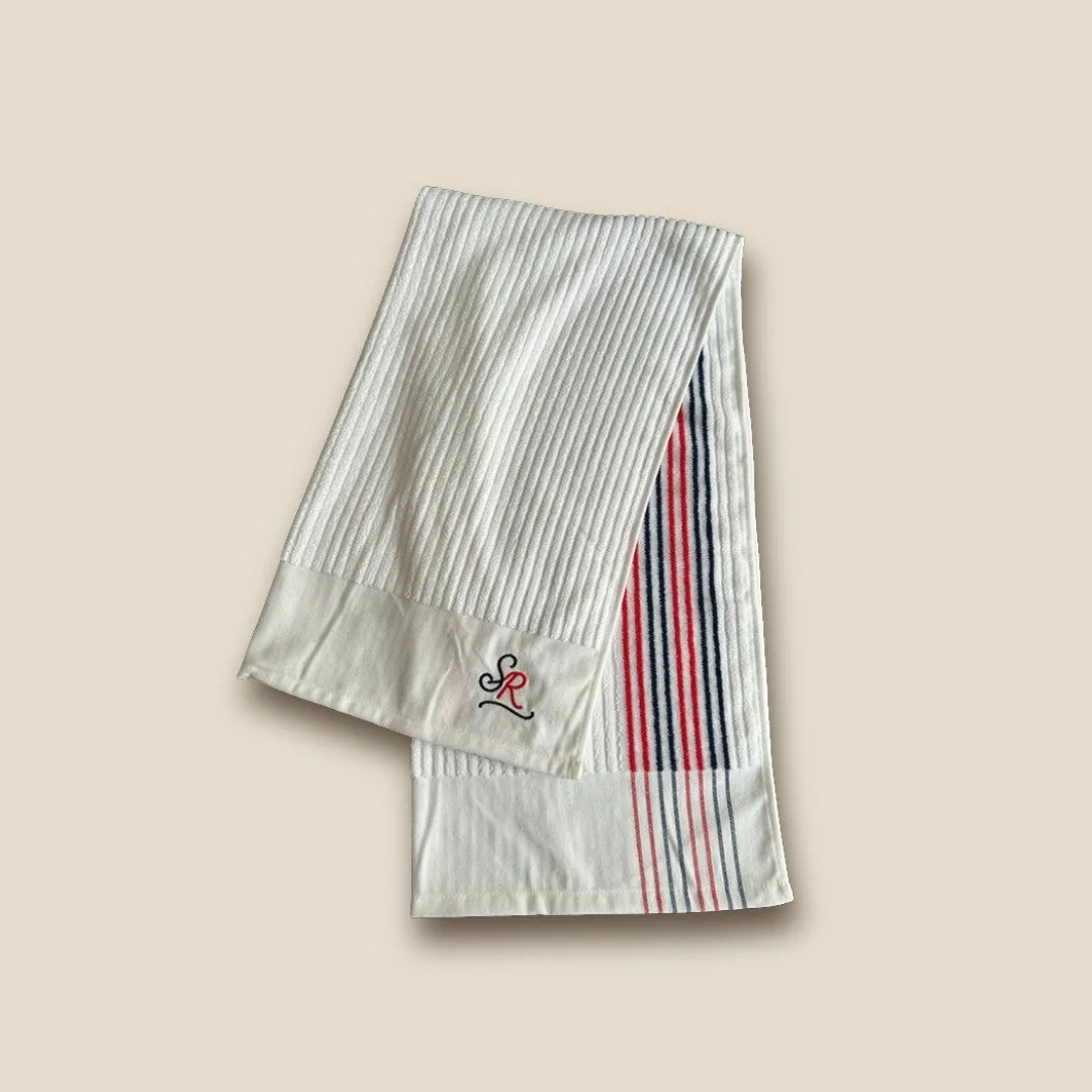sunday-rolls-golf-towel-red-blue-stripe-draped.jpg