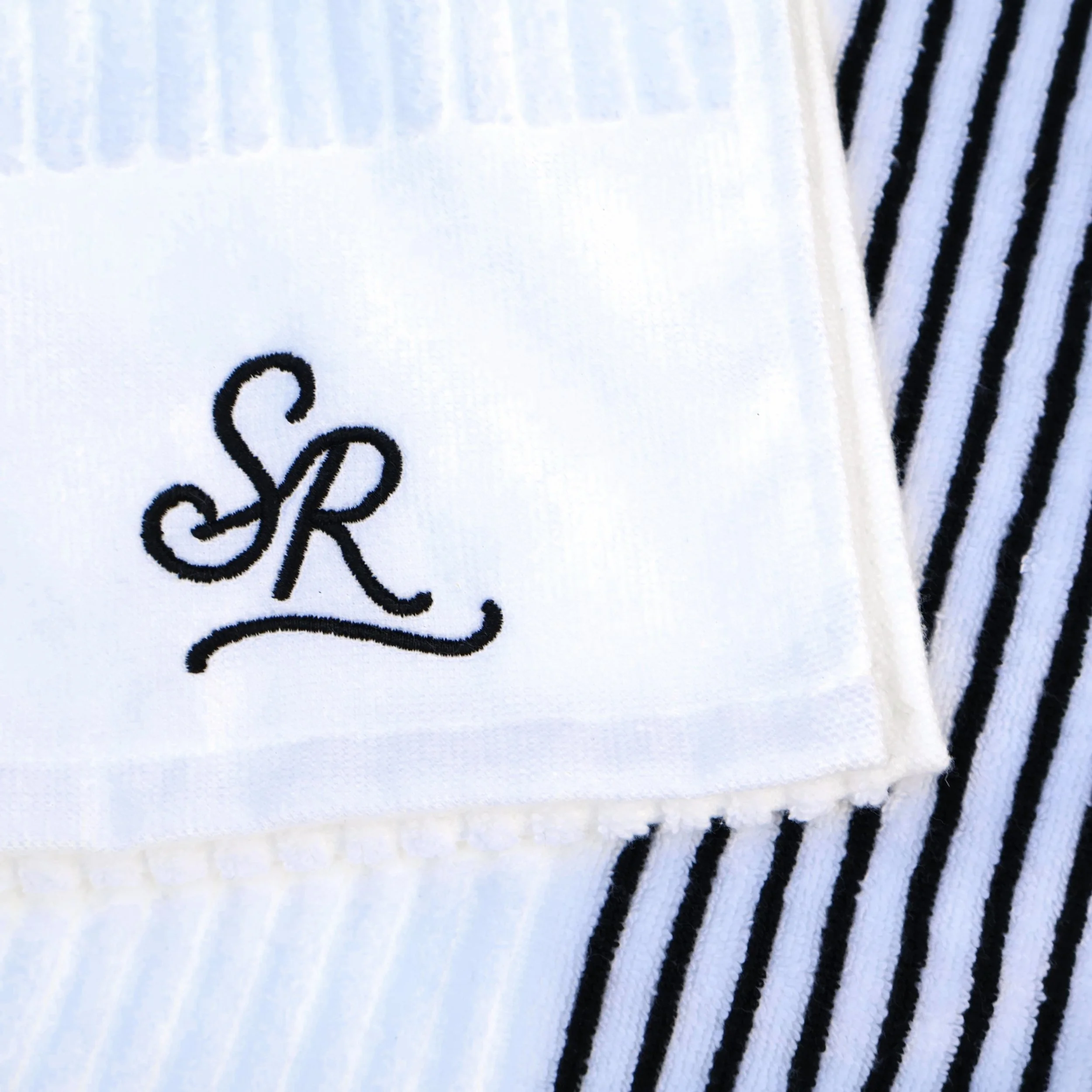 sunday-rolls-golf-towel-black-stripe-logo-detail.jpg