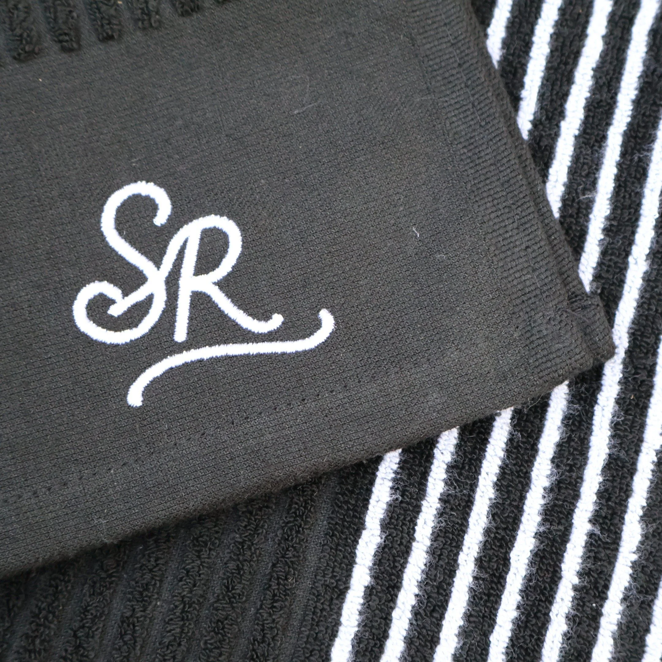 sunday-rolls-golf-towel-solid-black-logo-detail.jpg