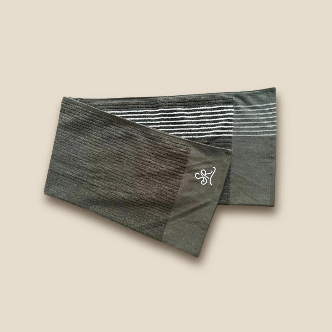 sunday-rolls-golf-towel-black-draped.jpg
