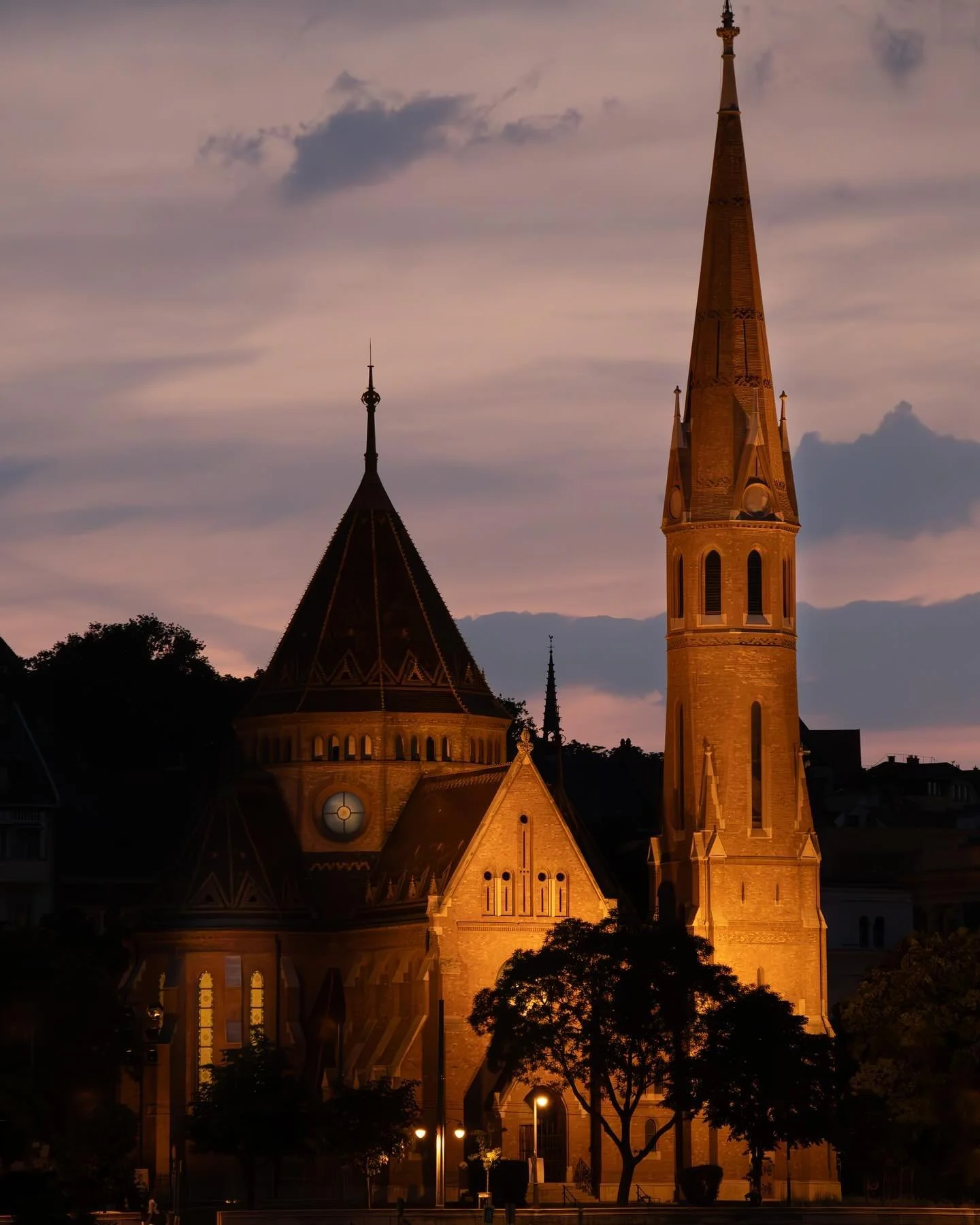 Budapest - Hungary, from Pentecost Sunday in the Catholic calendar. ⛪️

Right across the Hungarian Parliament from the Danube is the Szil&aacute;gyi Dezs&oacute; church (the translation calls it Square Reformed Church)&mdash;The lights during golden 