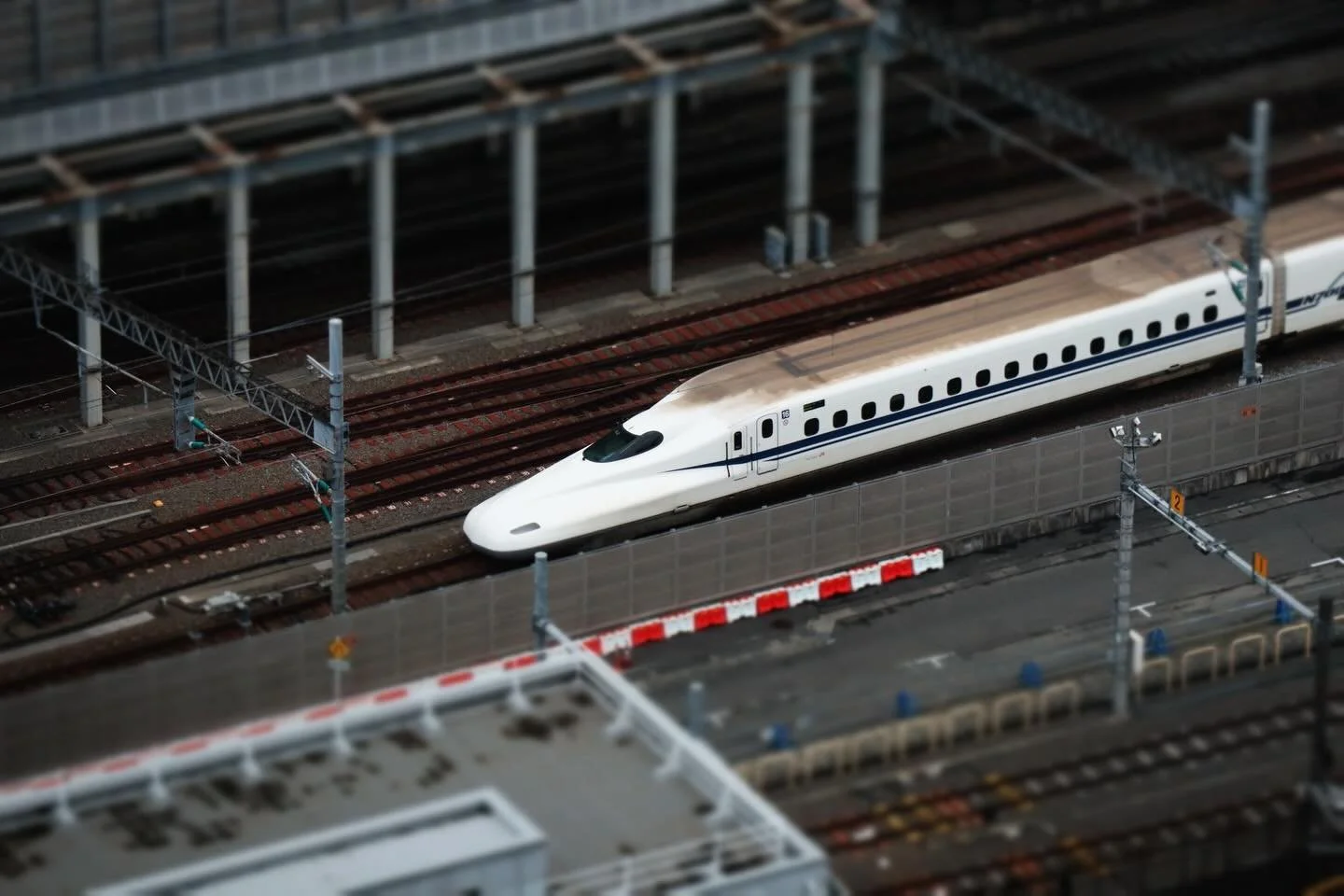 Mini Shinkansens
Used a miniature filter on my camera, which blurred areas close to the subject to imitate a large aperture blur of small and close objects

Tokyo, Takanawa Gateway Station