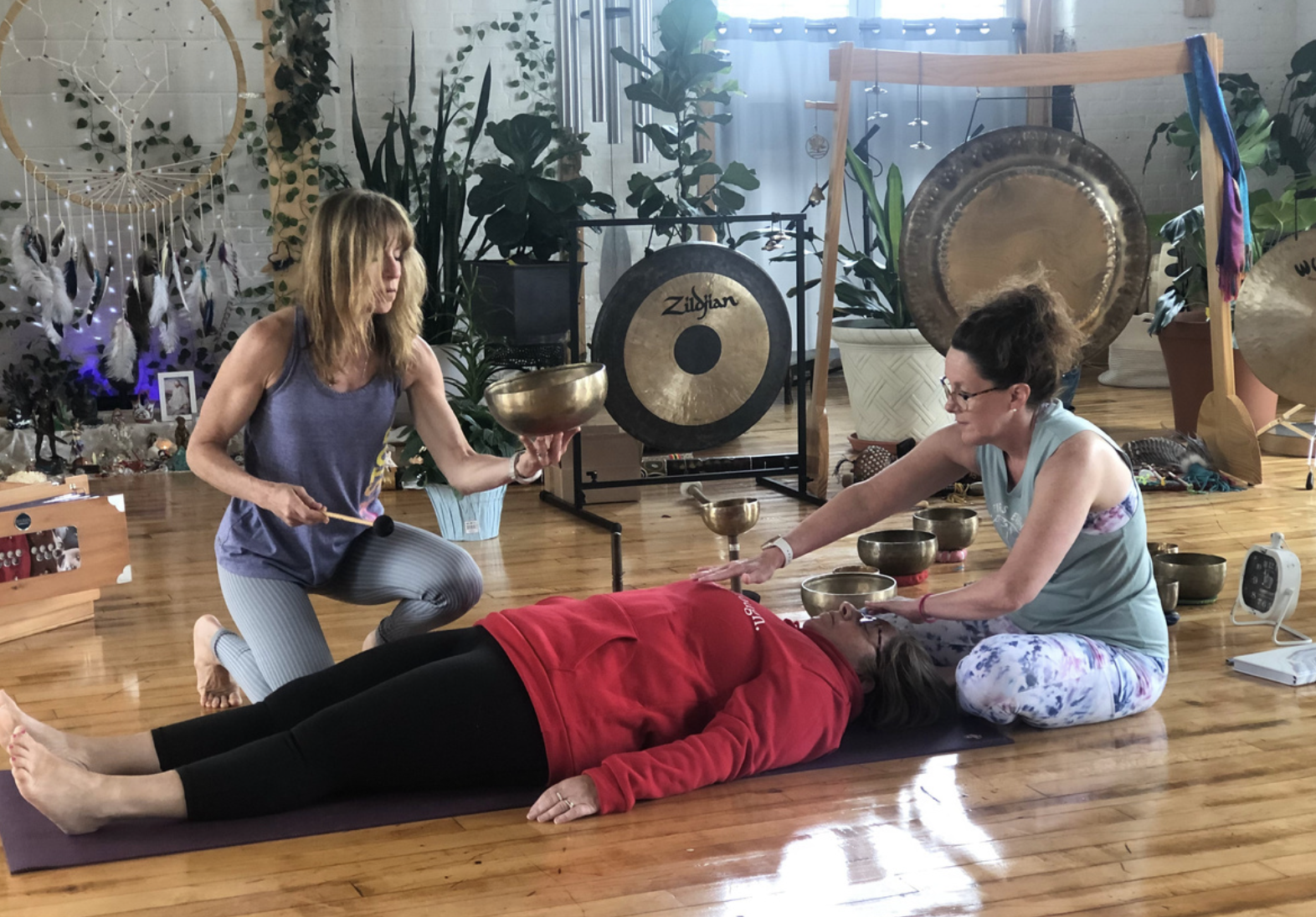 Laurie’s customers, Evan and Kade, running down a mountain after getting married. 