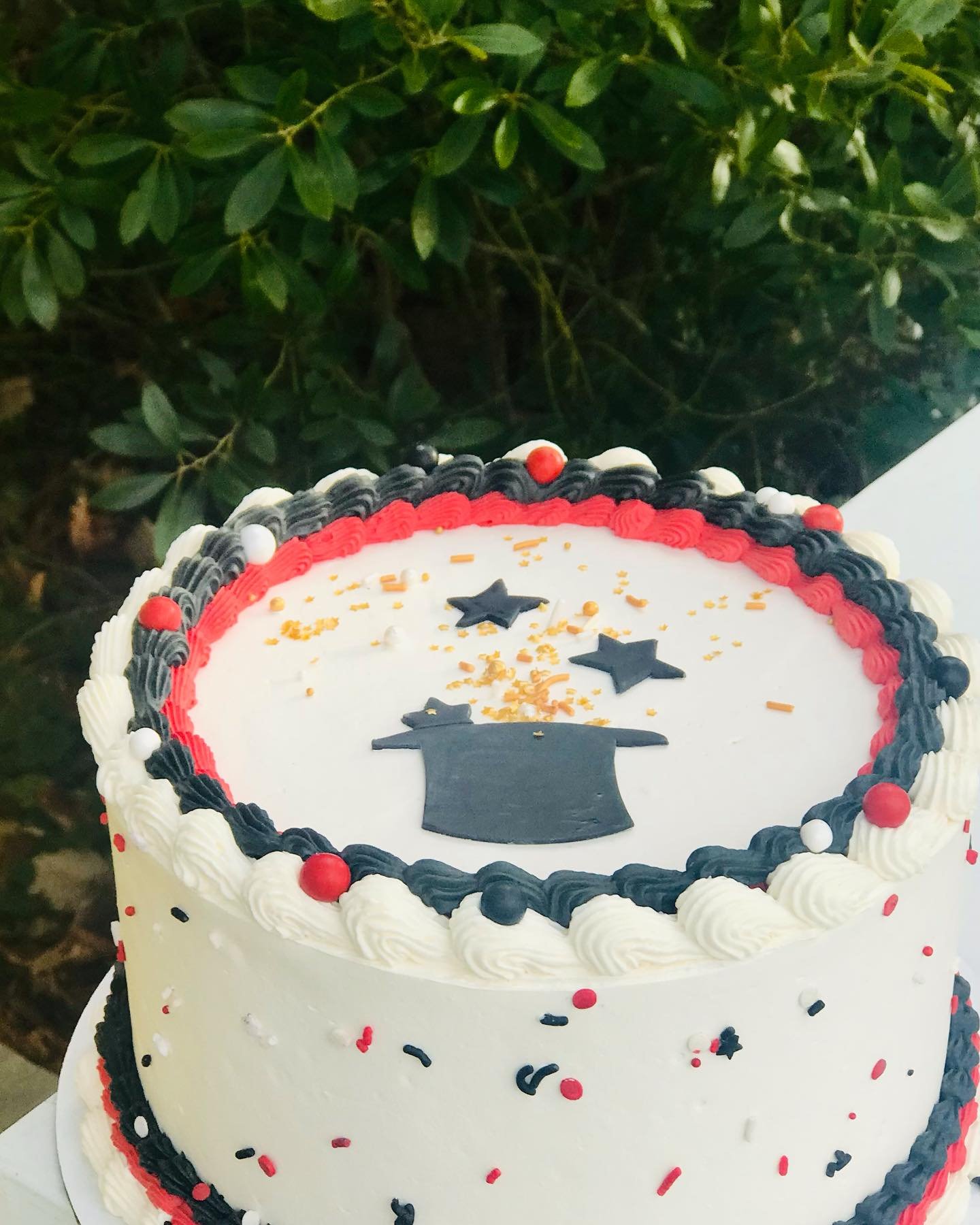 Magic Show / Magician themed cake.

The other day, my son found out in the worst way possible, that Santa wasn&rsquo;t real. He sobbed. I held. It was a dark moment, and it was an unfair moment and that&rsquo;s all I can say about that. We worked thr