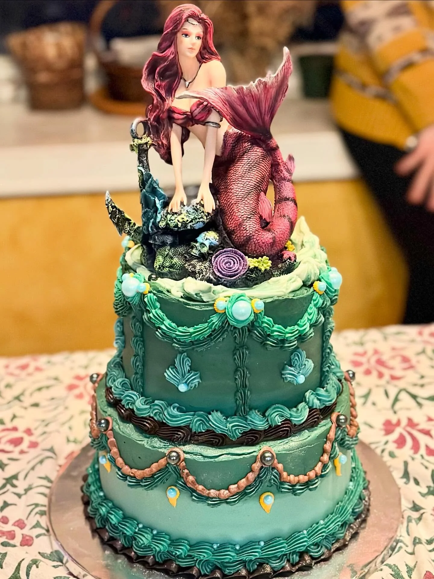 This really cool goth kid I know wanted a mermaid cake. I made her a cutesy pastel colored mermaid cake two years ago and wanted to do something a little different, so I leaned into the strange and mysterious on this one. Mermaid vibes? Check. Might 