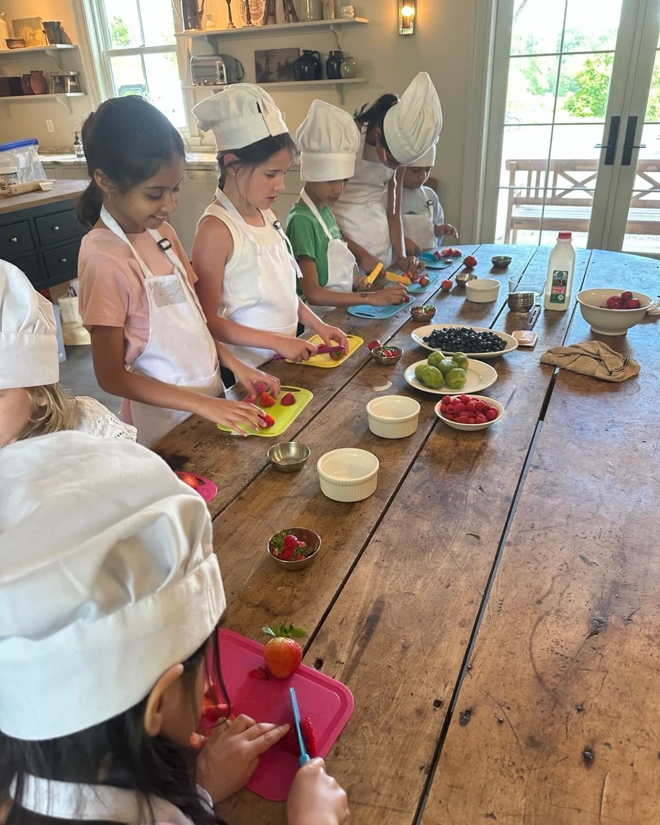 One thing I&rsquo;ve noticed about kids: when they&rsquo;re trusted with a real task, they tend to rise to it.

I took this pic during our fruit tart class and loved how focused everyone was. No posing, no prompting, just a table full of kids busy ma
