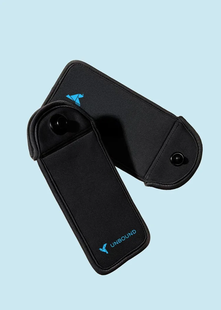 A black case with the UNBOUND logo, shown from multiple angles, on a light blue background.