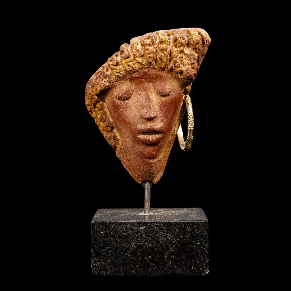 "Adorned", natural stone on granite base, 6 × 3 × 2 in., 2024