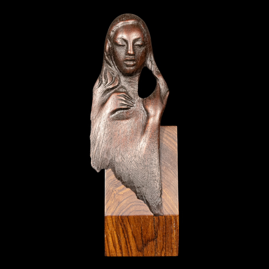 "Muse", wood on wood base, 9 × 3.5 × 2 in., 2012