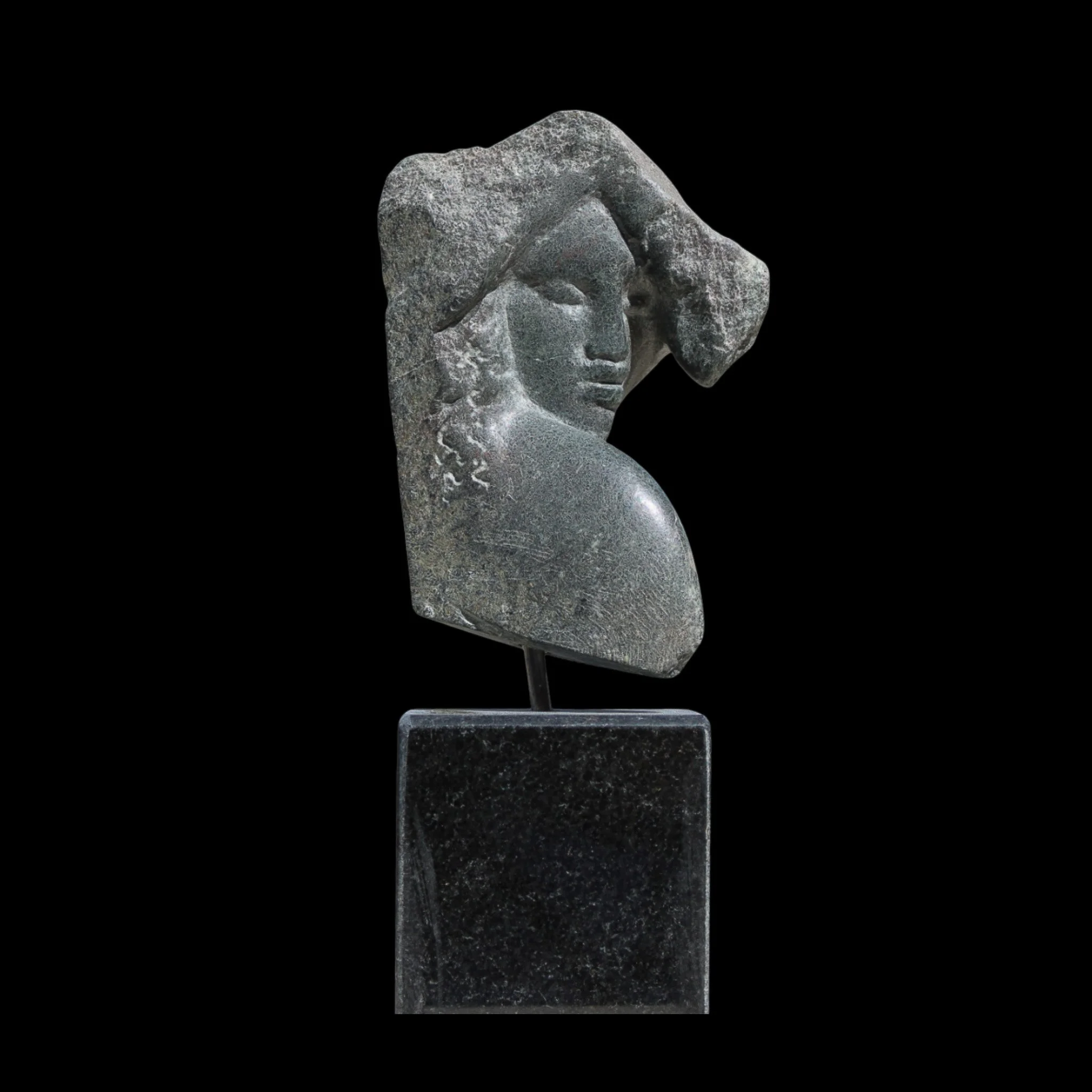 "Revelation", natural stone on granite base, 5 × 2.5 × 2.5 in., 2023