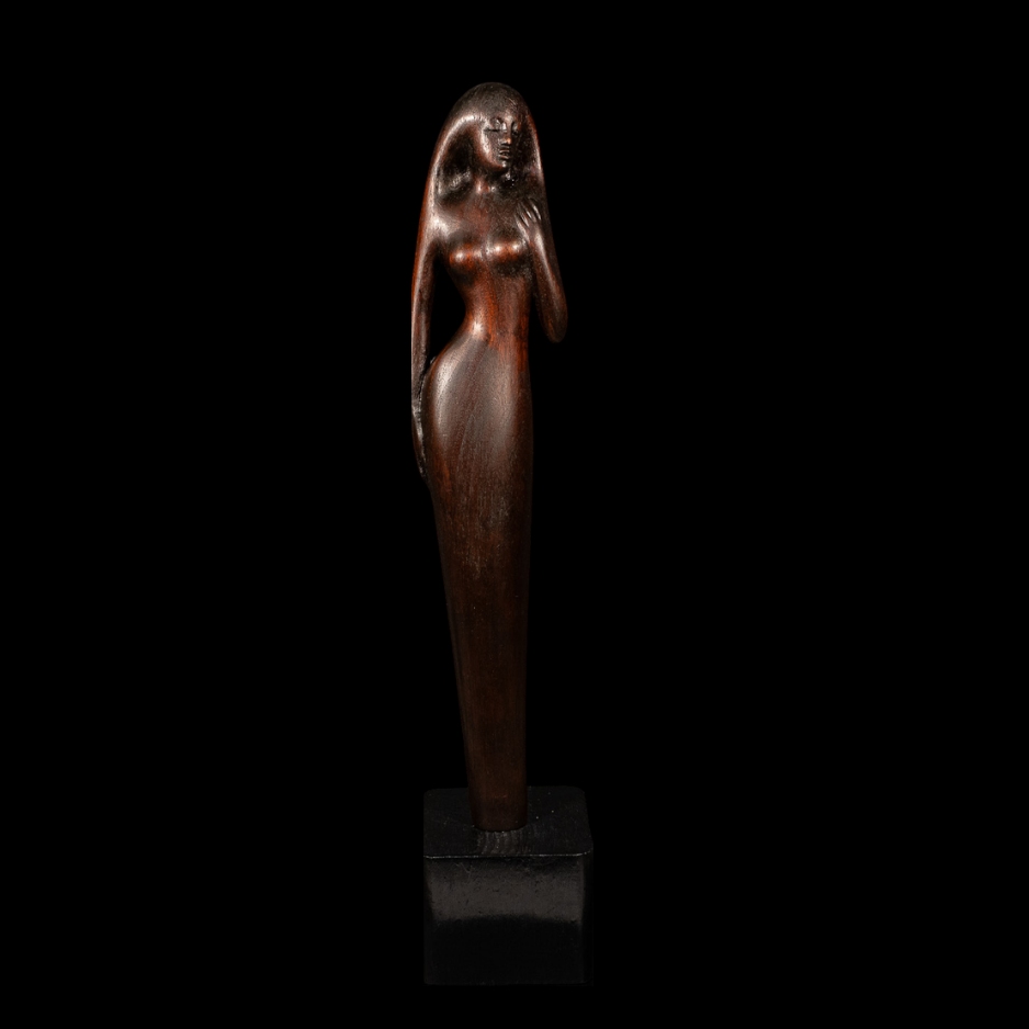 "Composed", wood on wood base, 22 × 5 × 4 in., 2012