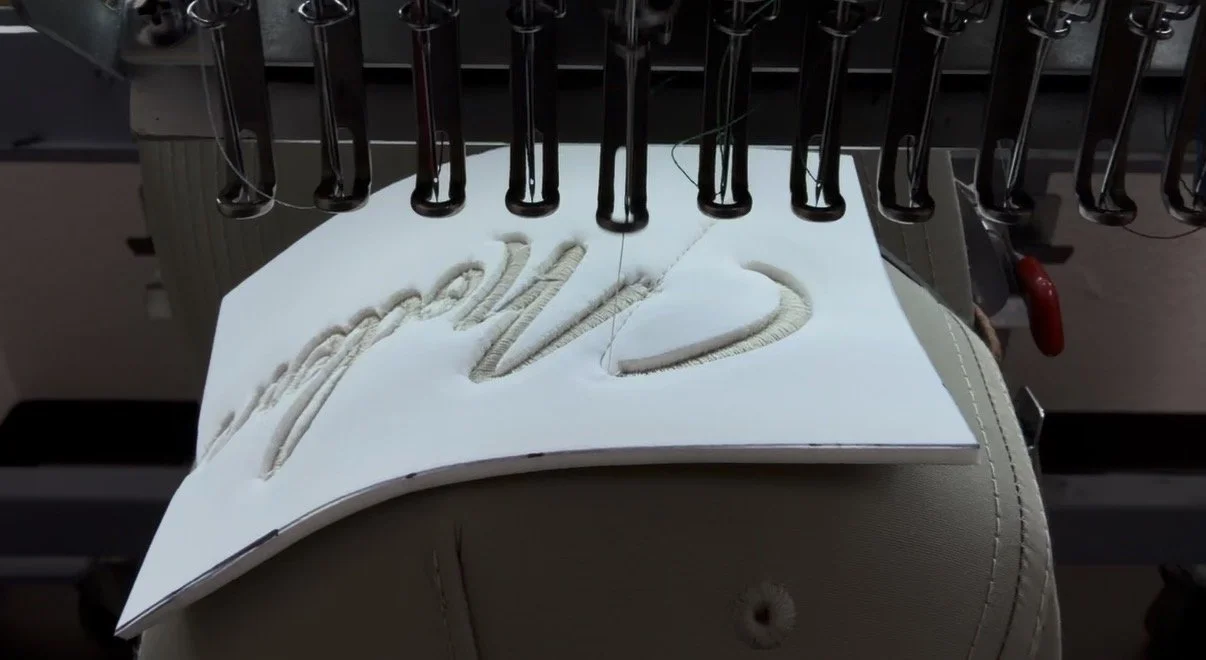 A hat being embroidered.