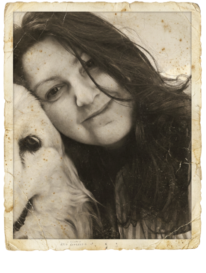 Artist Shanti Padme enjoying a cuddle with her much-loved dog, Zak.