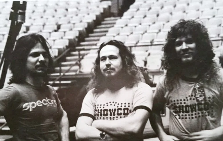 DALE-ML-TH-SHOWCO-SHIRTS-1976-GENESIS.jpg