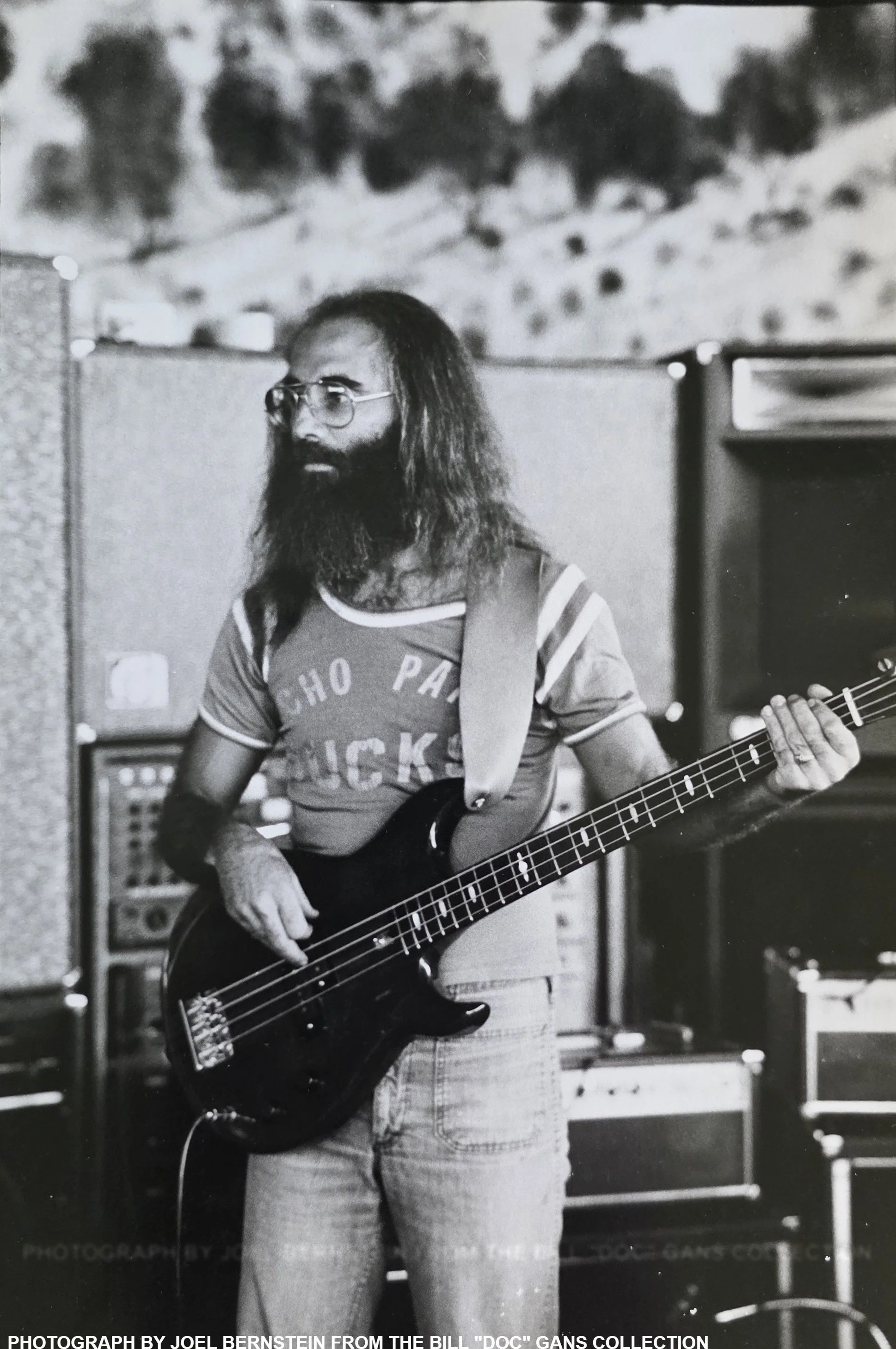 Leland Sklar wearing an Echo Park Ducks t-shirt. 1977