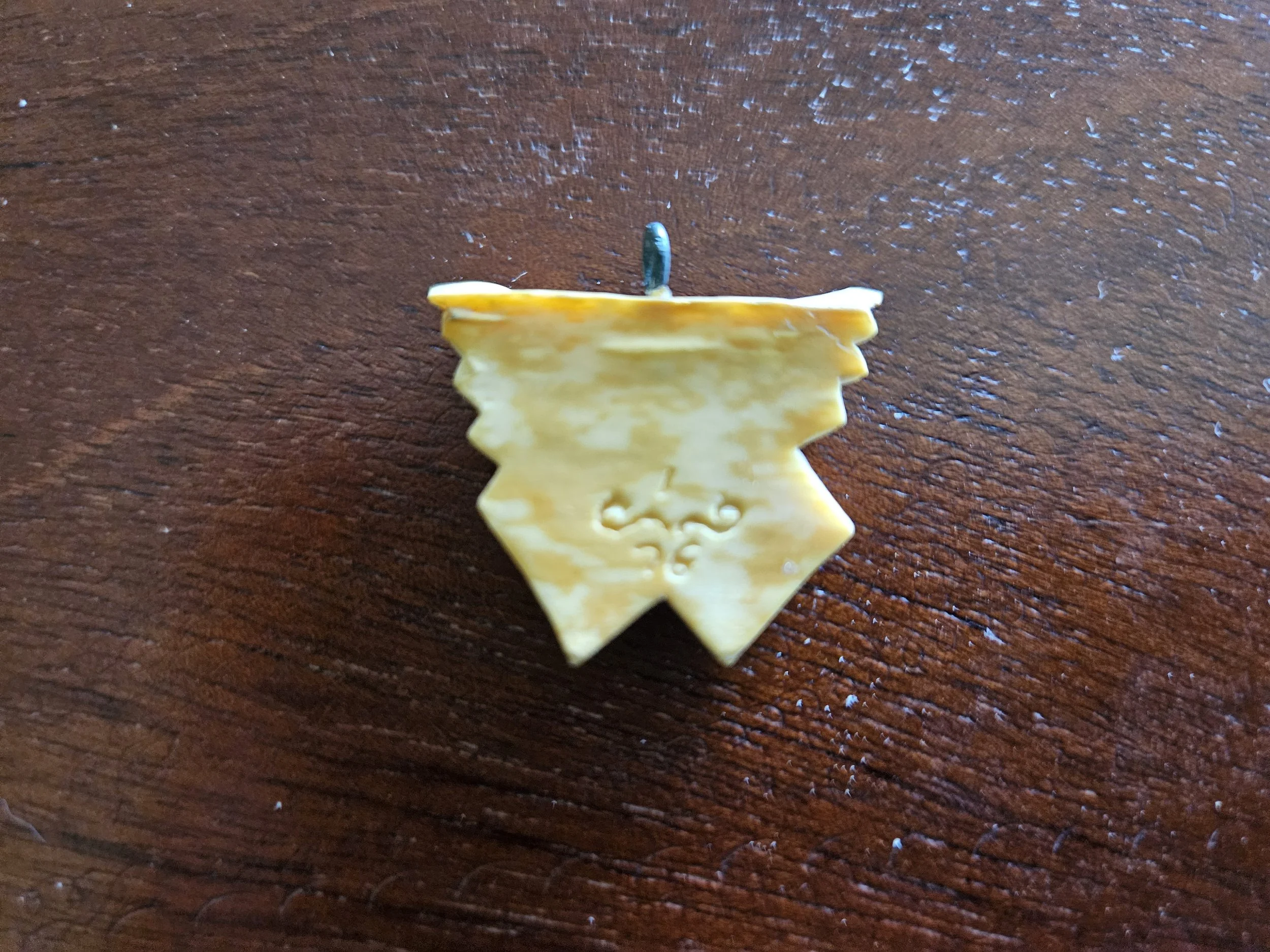 Wings Scrimshaw carved necklace made by a local Dallas artist from the Olla Podrida Shopping Center and given to Paul McCartney - courtesy of alum Chari Short whom was tasked with gifting it to Paul. Paul can be seen wearing one in many images. 1976 