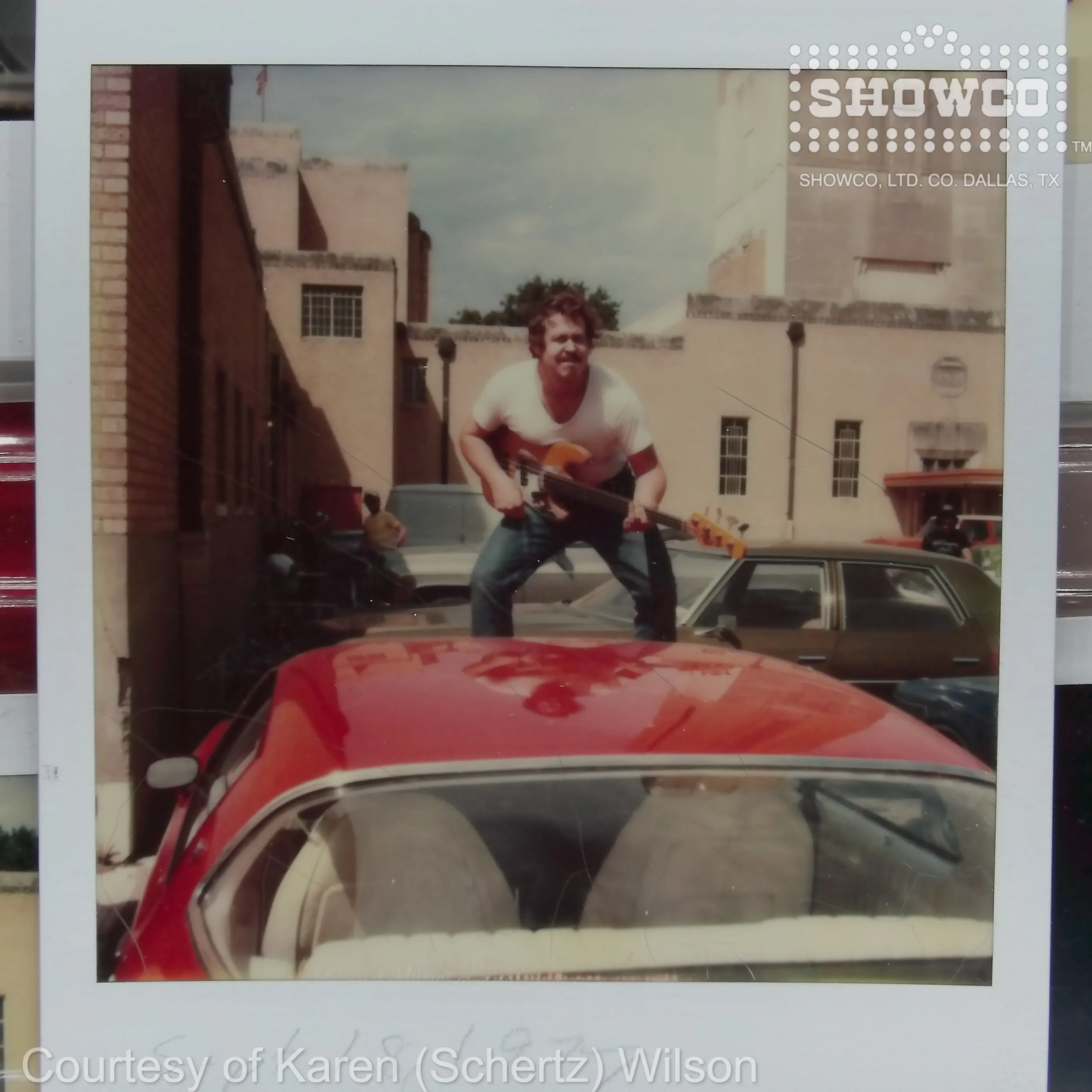ML ON CAR WITH GUITAR 9.18.77