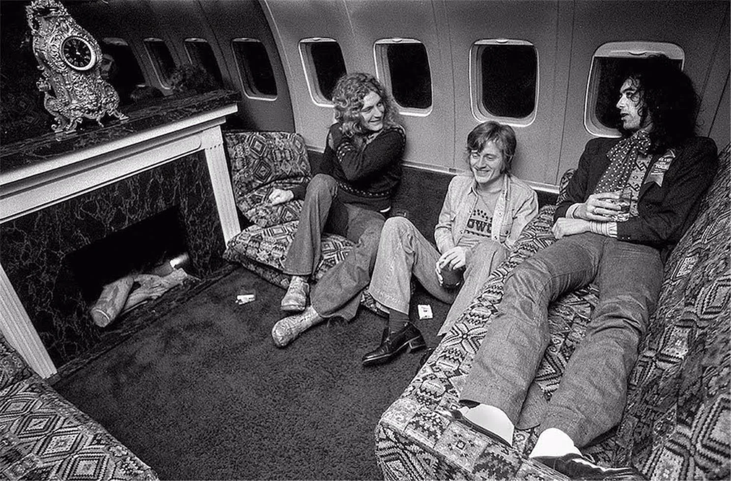 Robert Plant, John Paul Jones (in Showco shirt), Jimmy Page on private jet