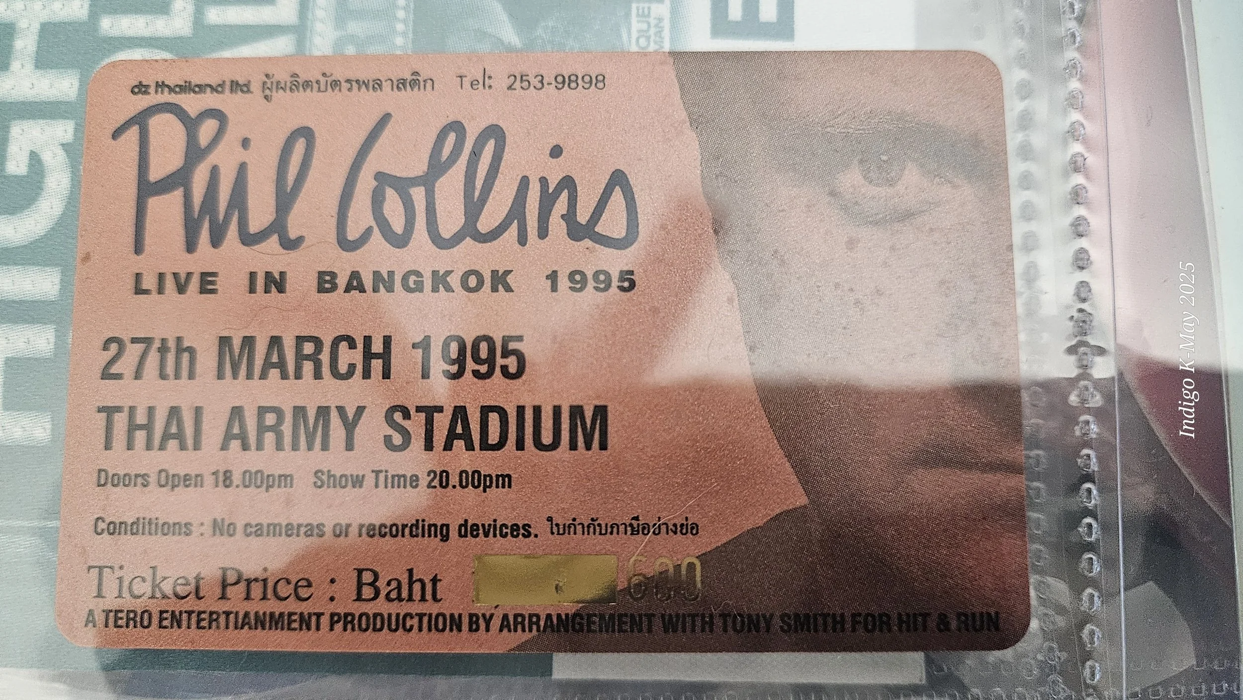 Phil Collins Live in Bangkok event details: March 27, 1995, Thai Army Stadium. Reverse of the ticket/pass in Joey’s collection.