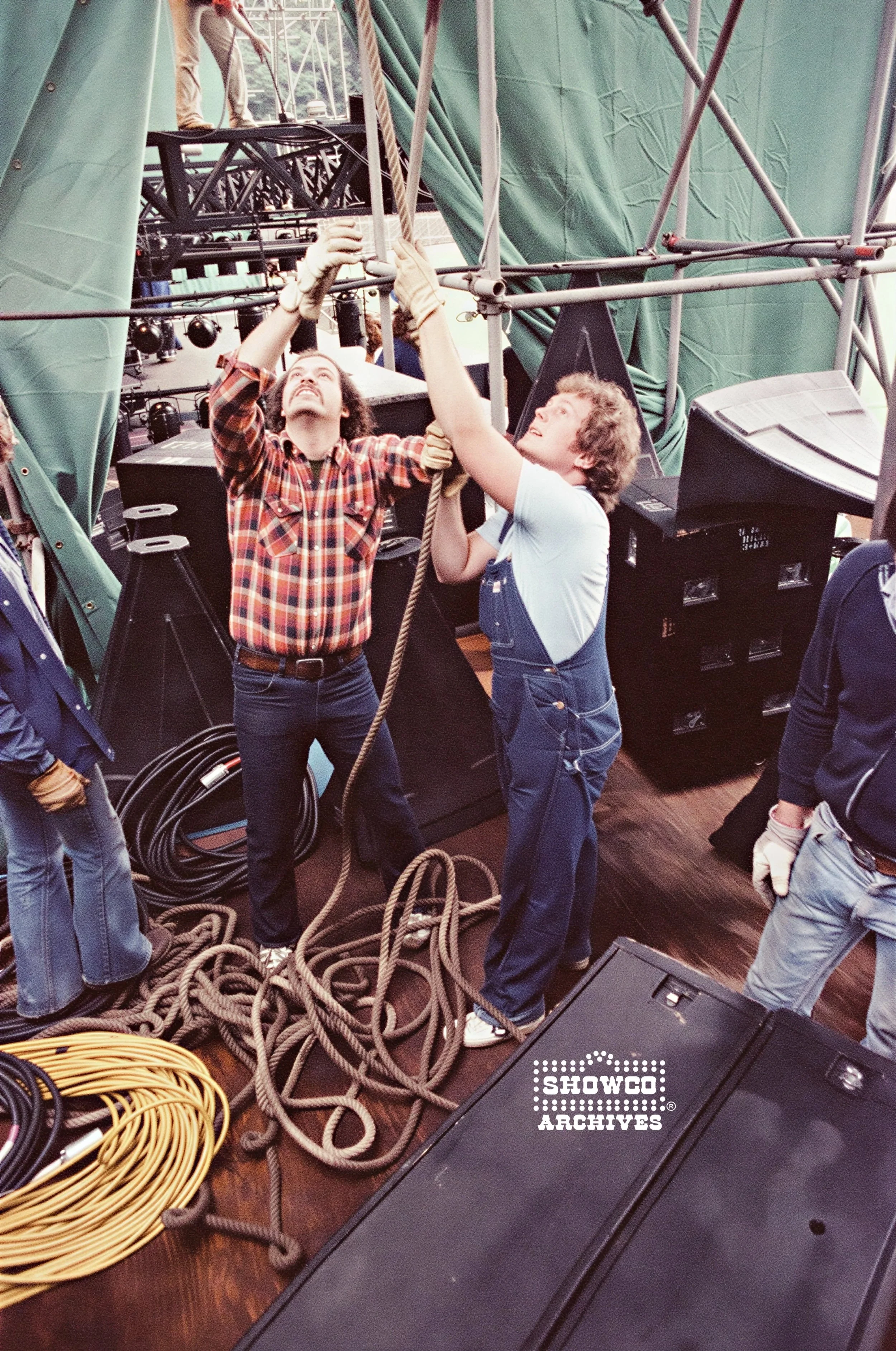 Craig Schertz, Johnny Roberts (Showco crew) working side stage at Summertime Open Air Festival, Ulm, Germany, 1978. Courtesy of the Showco Archives.