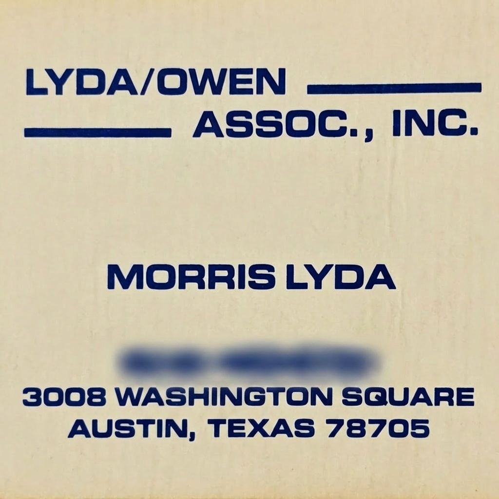 Business card phone number extra heavily blurred.png