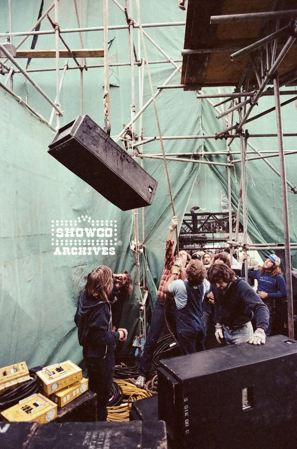Showco crew: Craig Schertz, Johnny Roberts, Groovy and more, working side stage at Summertime Open Air Festival, Ulm, Germany, 1978. Courtesy of the Showco Archives.