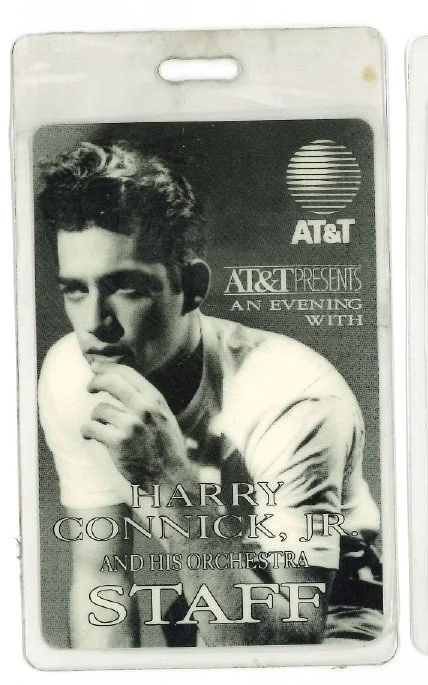 Harry Connick Jr. staff laminate with a black-and-white portrait.