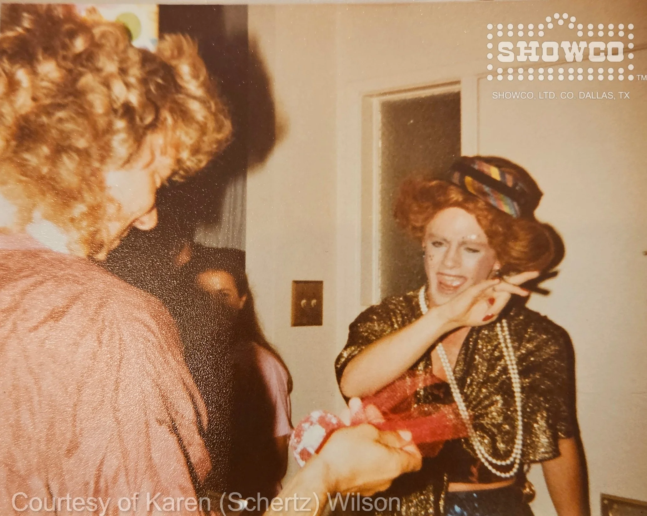 Robert Plant and the surprise guest share a laugh during one of the evening's most memorable moments.