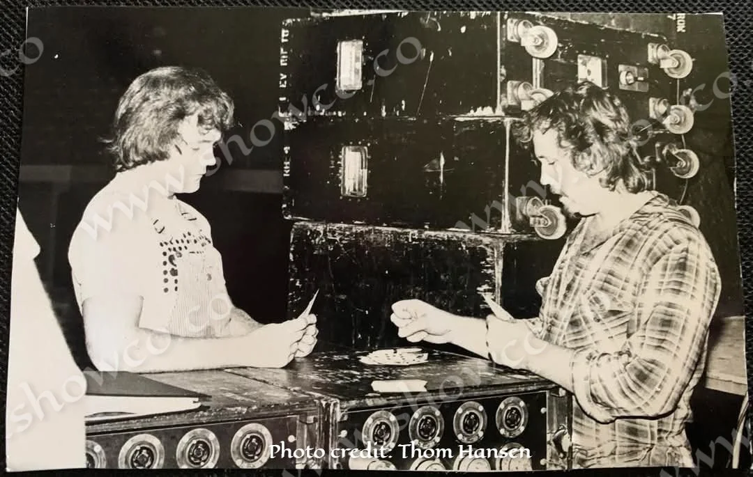 JW and ML playing a game of GIN during the Genesis tour 1978