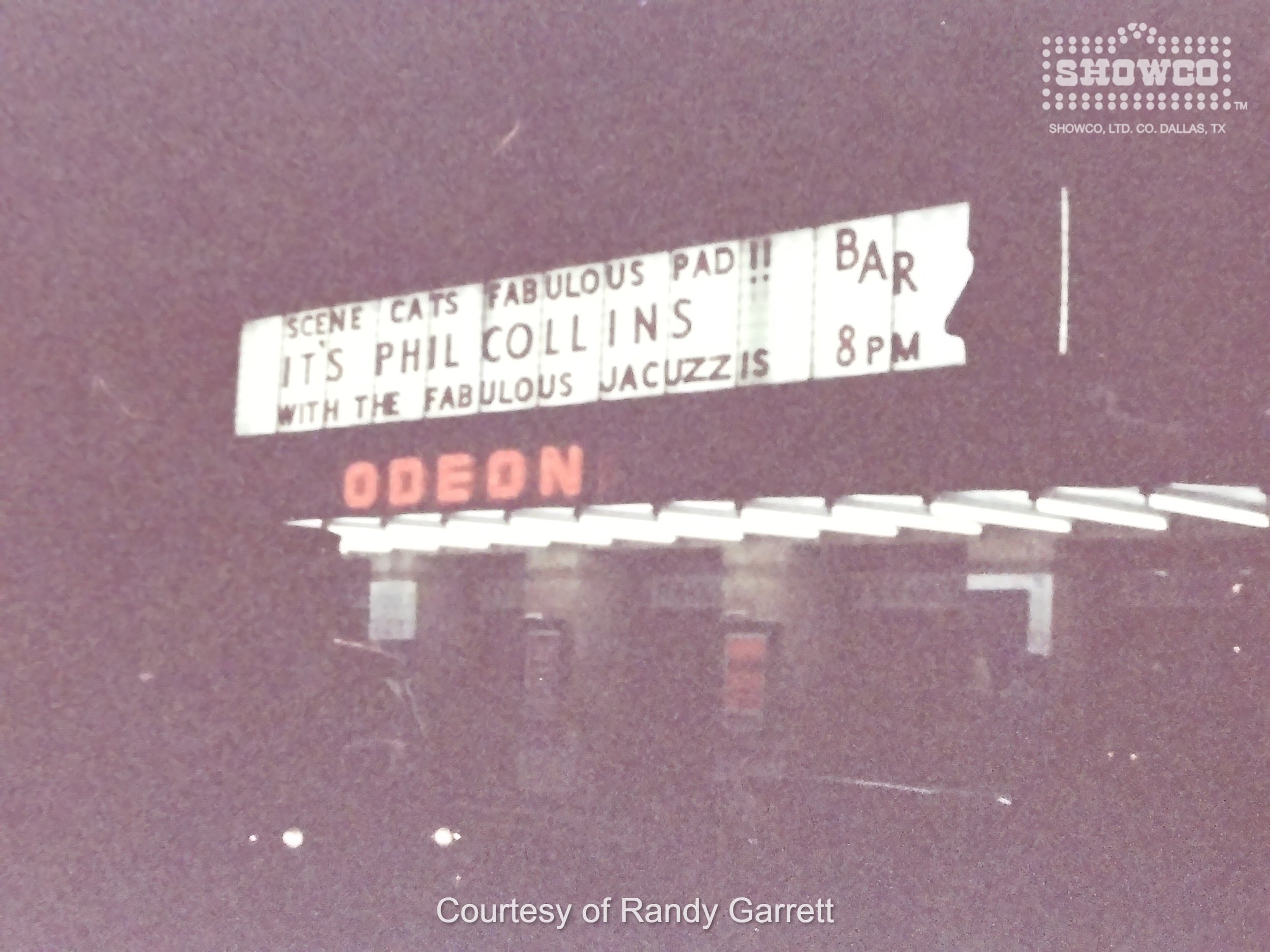 Historical December of 1982 photo of the Perkins Palace marquee in Pasadena, California, featuring Phil Collins and 'The Fabulous Jacuzzis' during his solo Hello, I Must Be Going! Tour