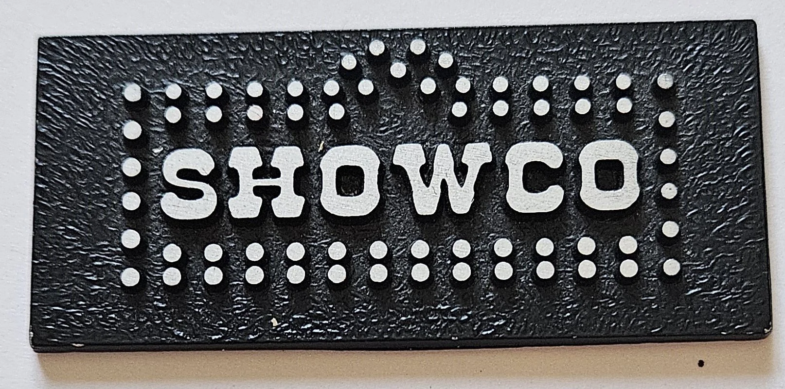 SHOWCO SPEAKER PLATE LOGO (2).jpg