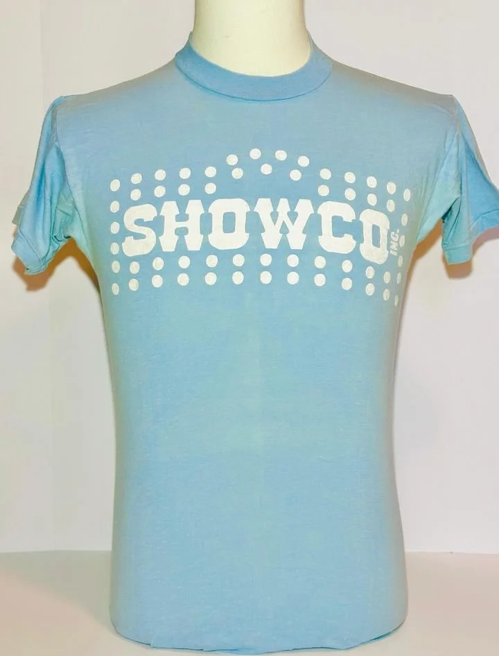 Showco Inc.  Who '76 white on blue shirt - courtesy of Jason Gifford