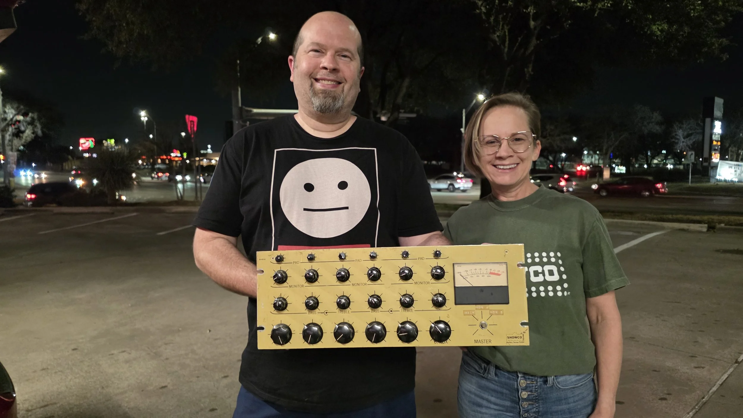 Indigo Kretzschmar-May receiving a donated Showco yellow mixer manufactured in April 1977.