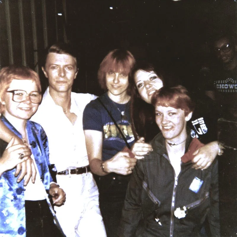 1978 Copenhagen - Bowie with fans and George Murray in a Showco shirt in back. 