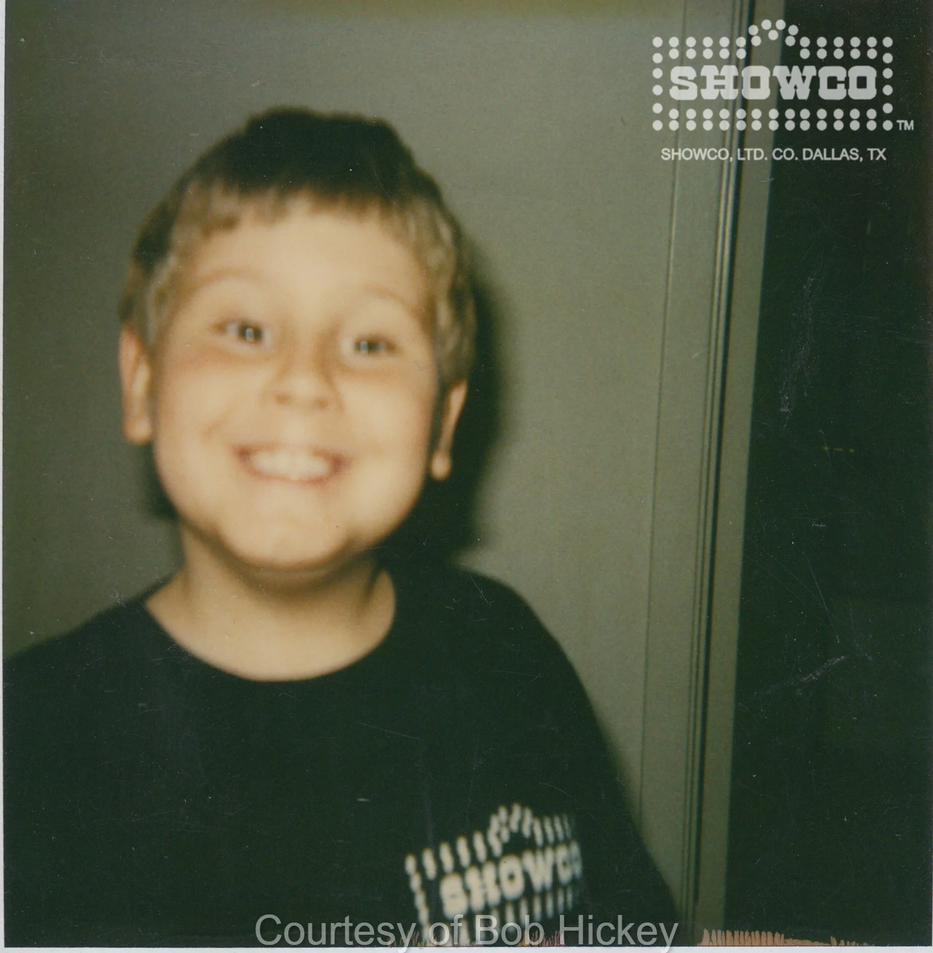 KID IN SHOWCO SHIRT.jpg