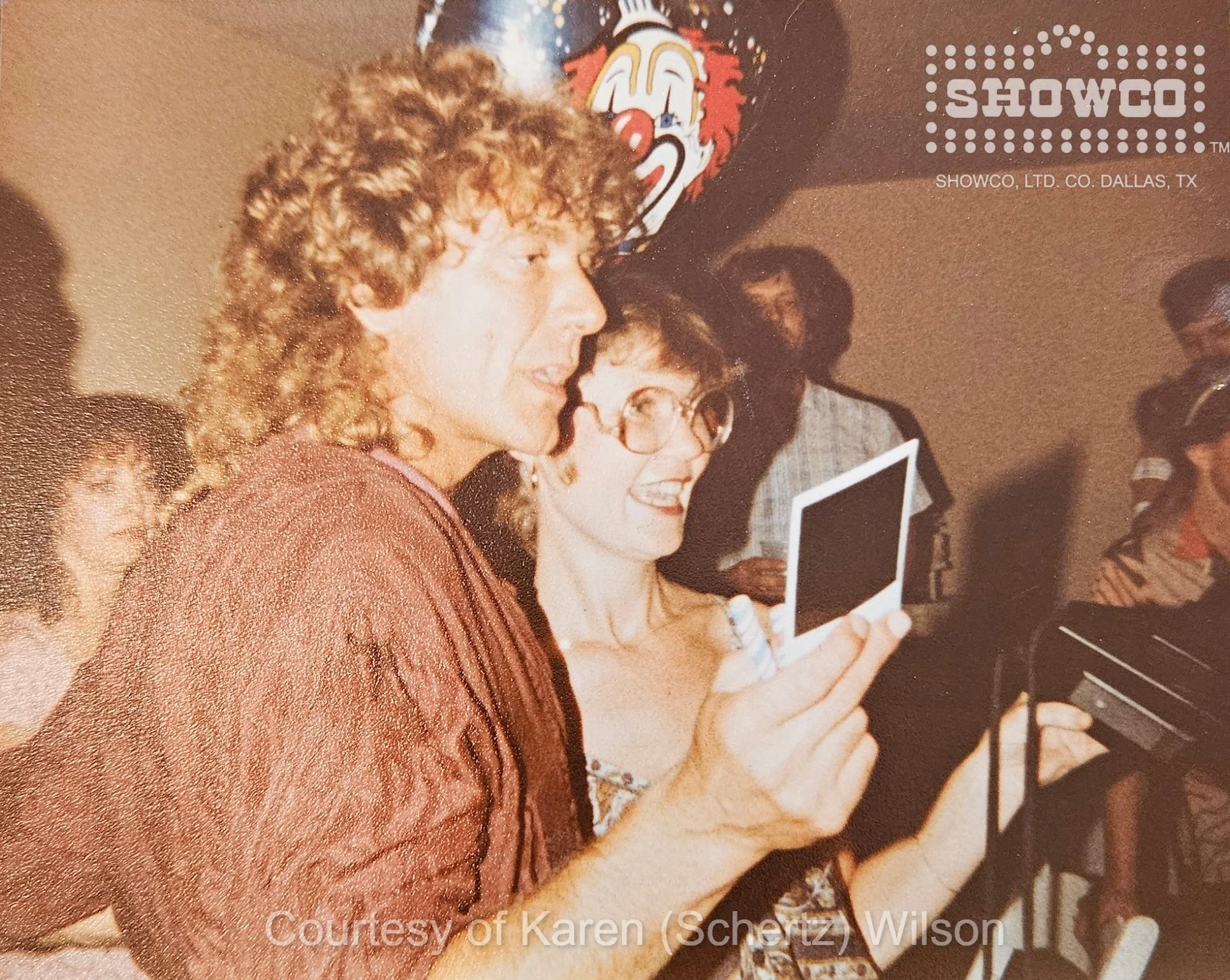 Robert Plant poses for a Polaroid with Chari Short before the party continued late into the night.