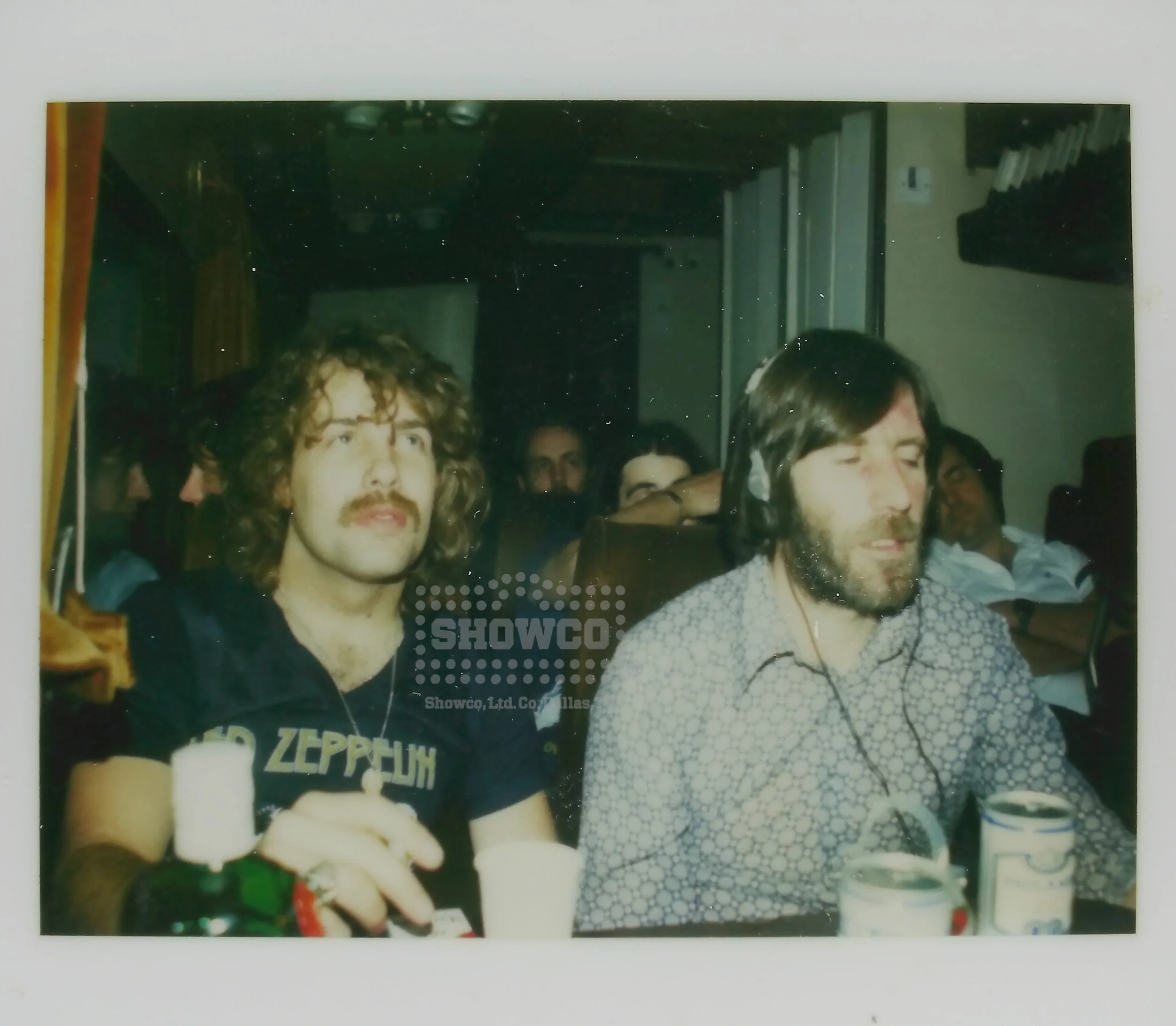 1977 Led Zeppelin Crew on Bus; Rusty Brutsche asleep behind