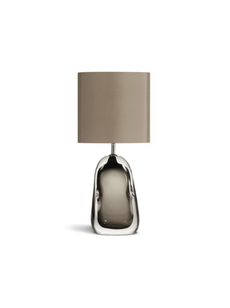 a glass based lamp from porta romana collection