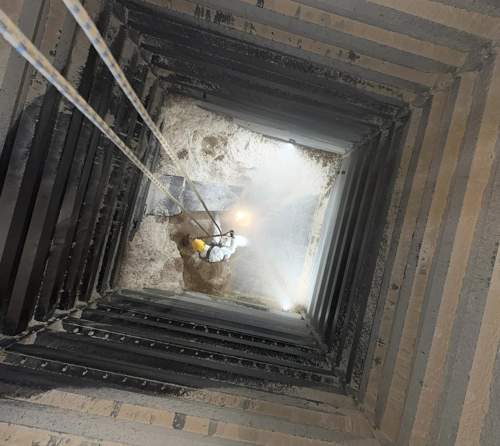 A Clan Ropes worker clears a confined space