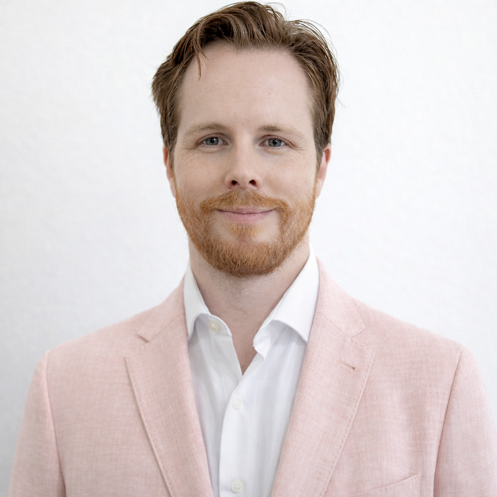Mitchell Munnings Endocrinologist wearing a Pink blazer on a white background