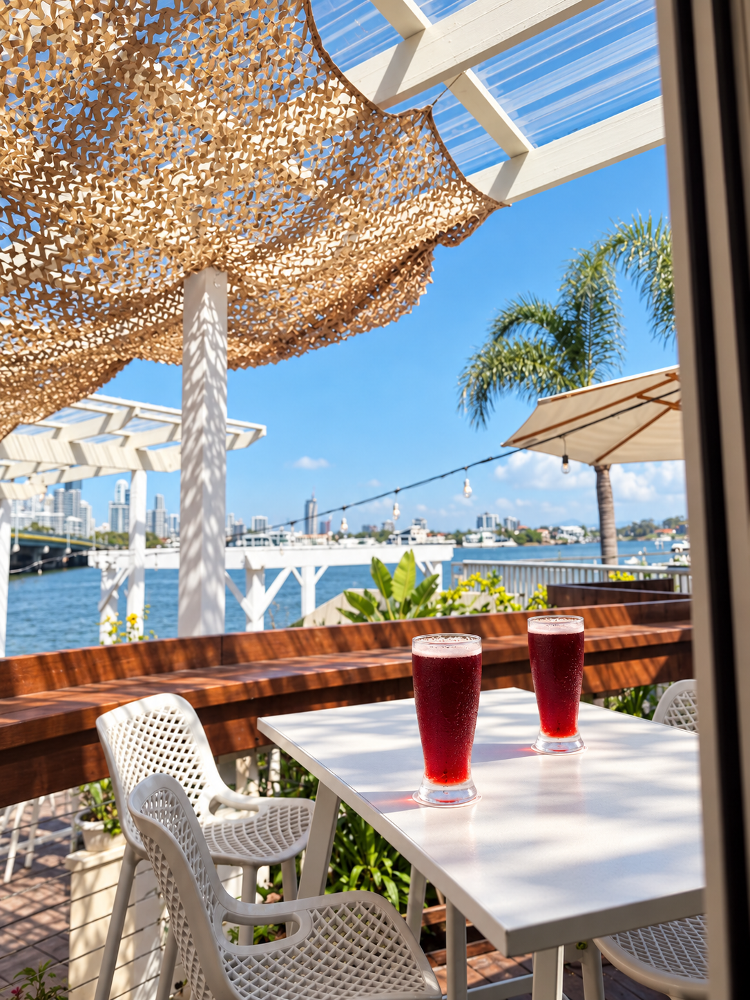 RiverHouse Southport terrace table with two gold coast cherry beers on the table