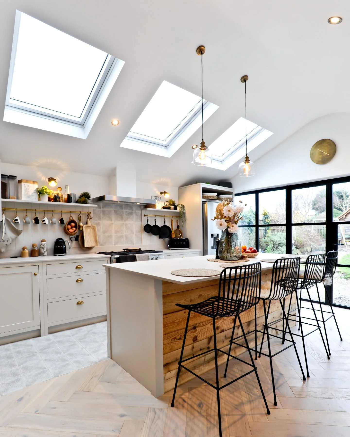 Ugh, this weather! It is May. However, I think we are growing accustomed to the drear here in Kent. I just want some sky.

But, for rainy days like these, this is a wonderful example of one of our kitchens that brings in the light. Not only through t