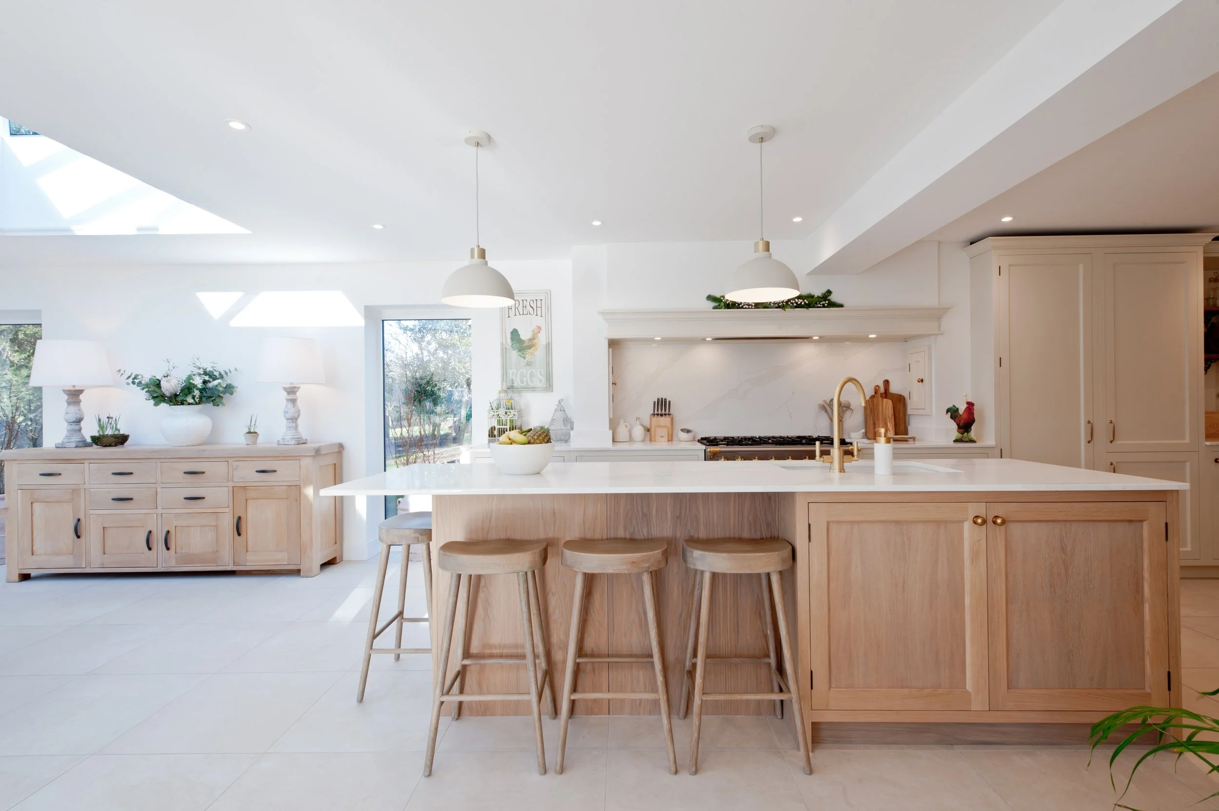 oak kitchen island and painted cupboards