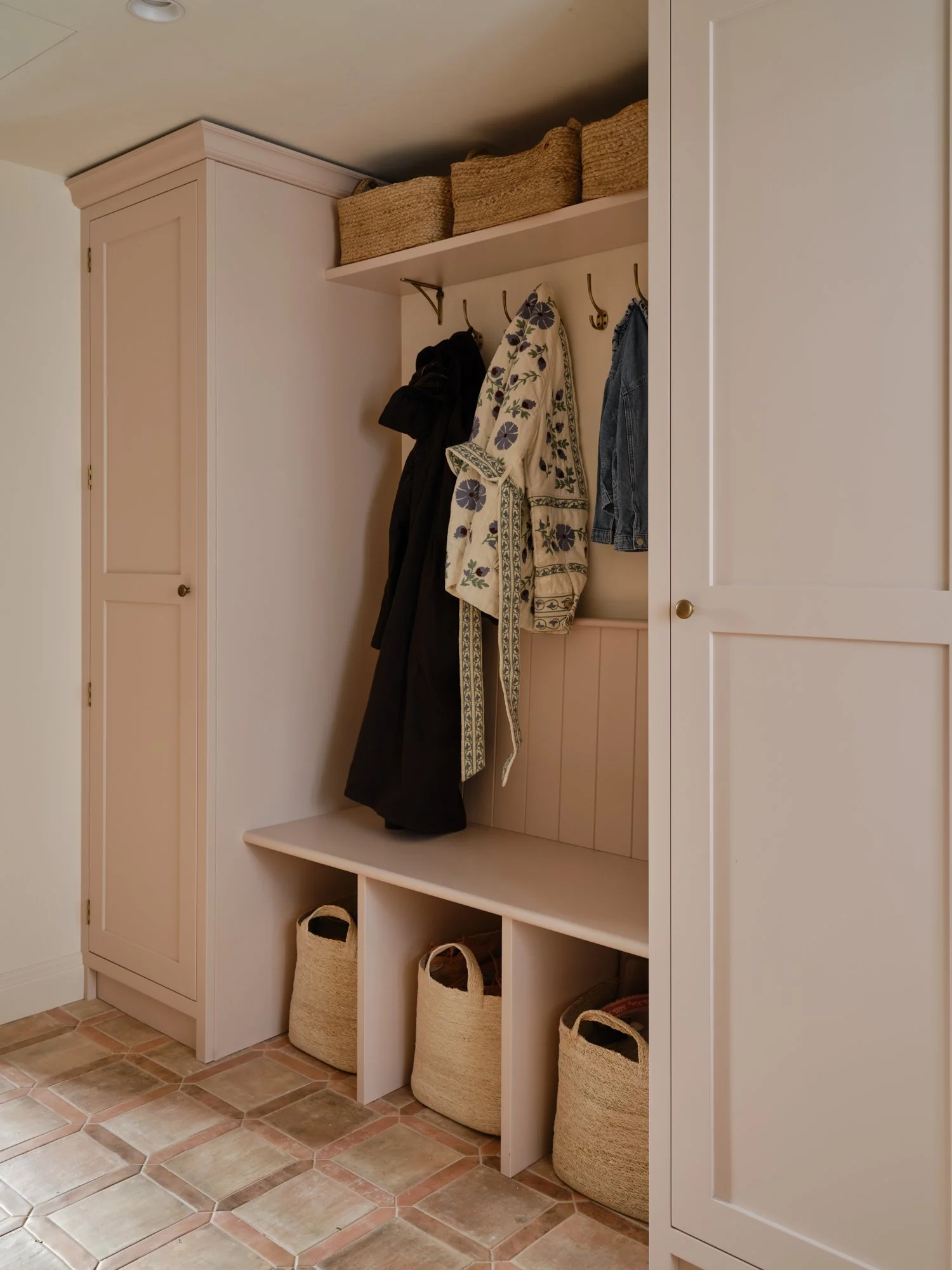 All dressed up with somewhere to go. Bespoke boot room storage for coats, shoes and everything in between.