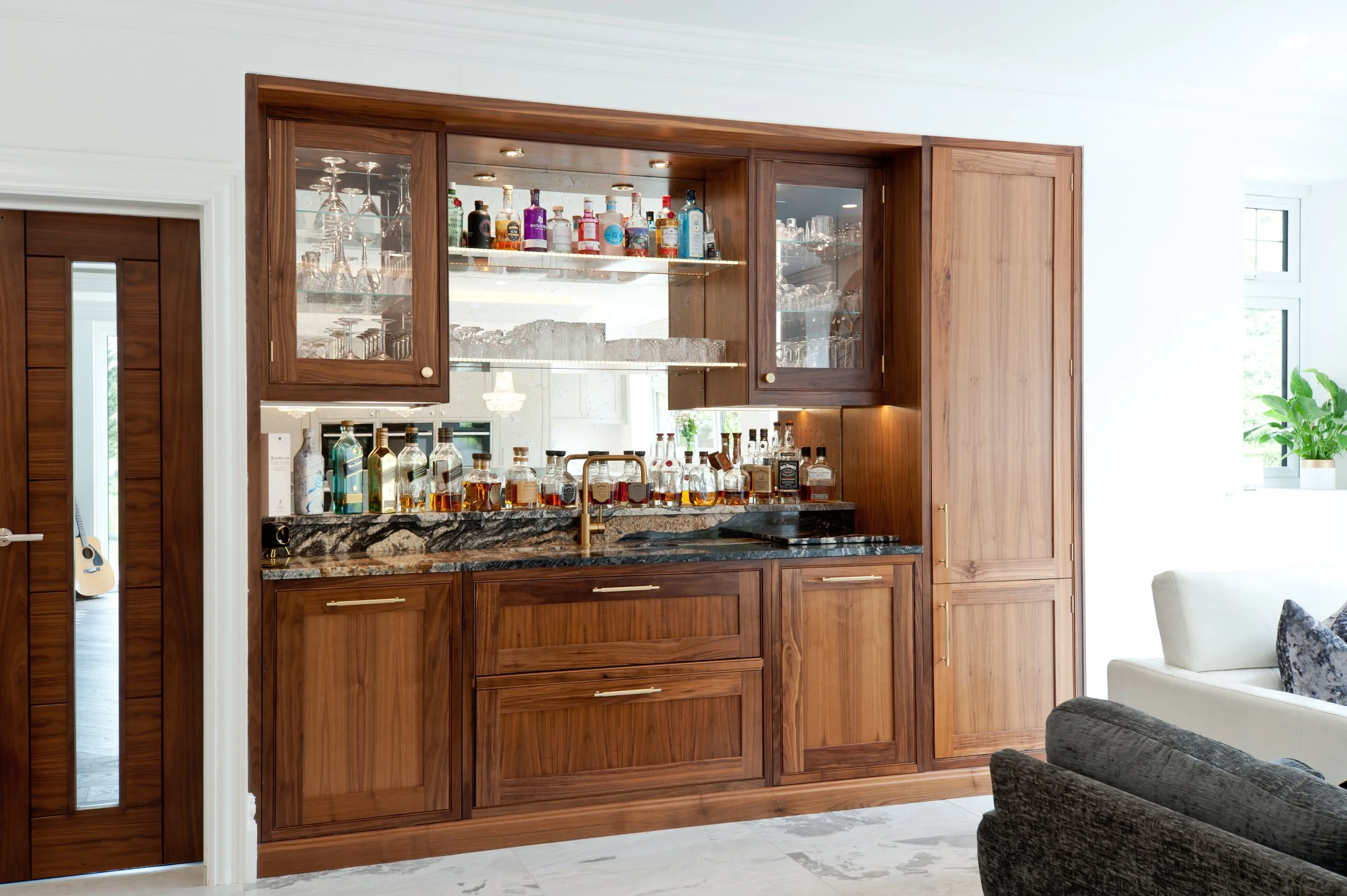 A spirited little number. Bespoke drinks cabinetry with dedicated storage for bottles, glassware and barware.