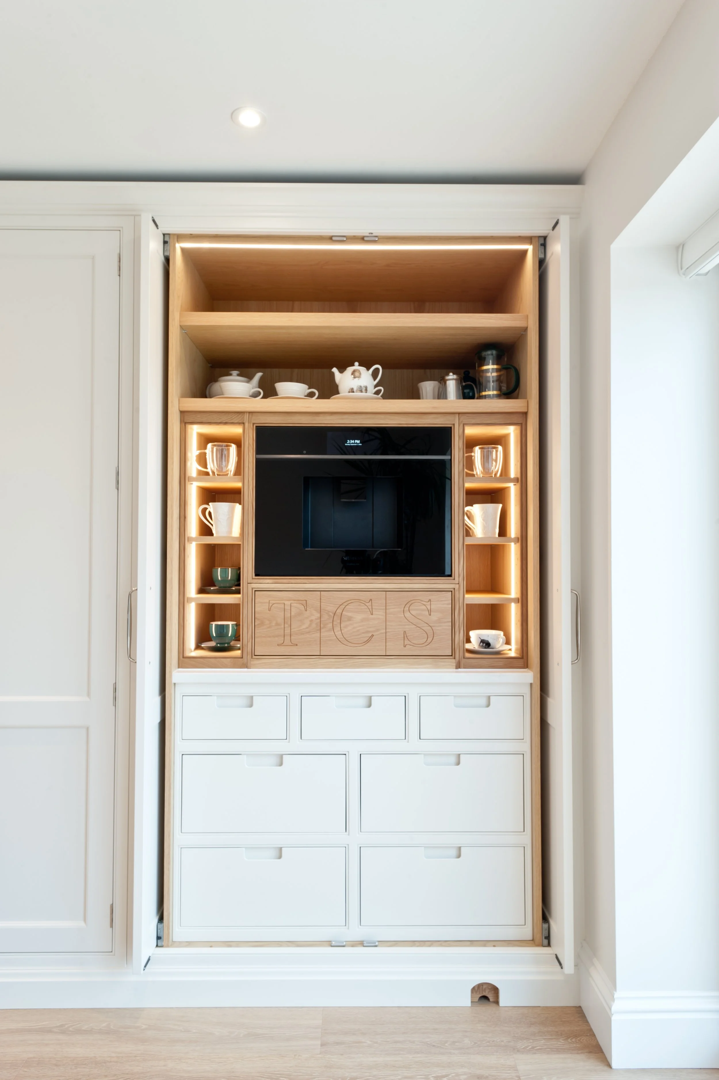 full height larder cupboard in bespoke kitchen in new romney