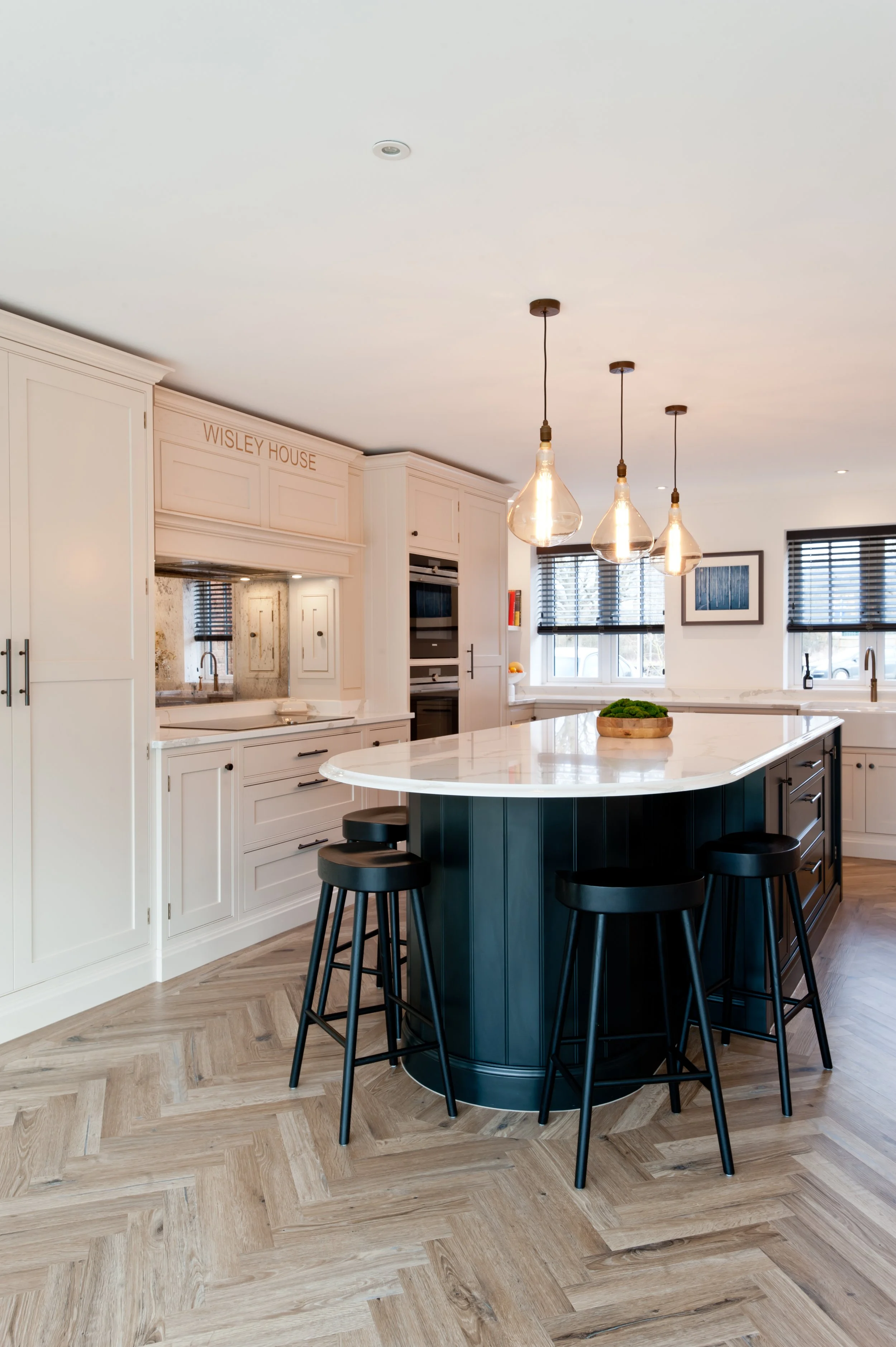 Standing Out from the Crowd: a Dark Painted and Curved Island, Ashford, Kent