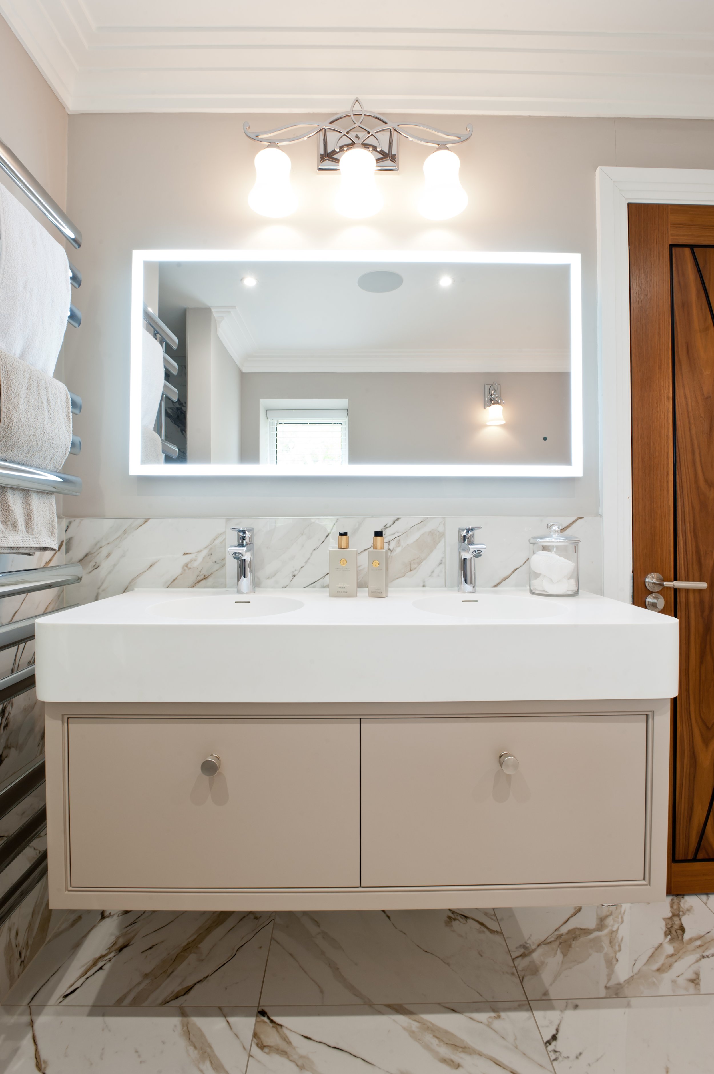 Light work. A wall-hung bespoke vanity keeps this bathroom beautifully calm and uncluttered.