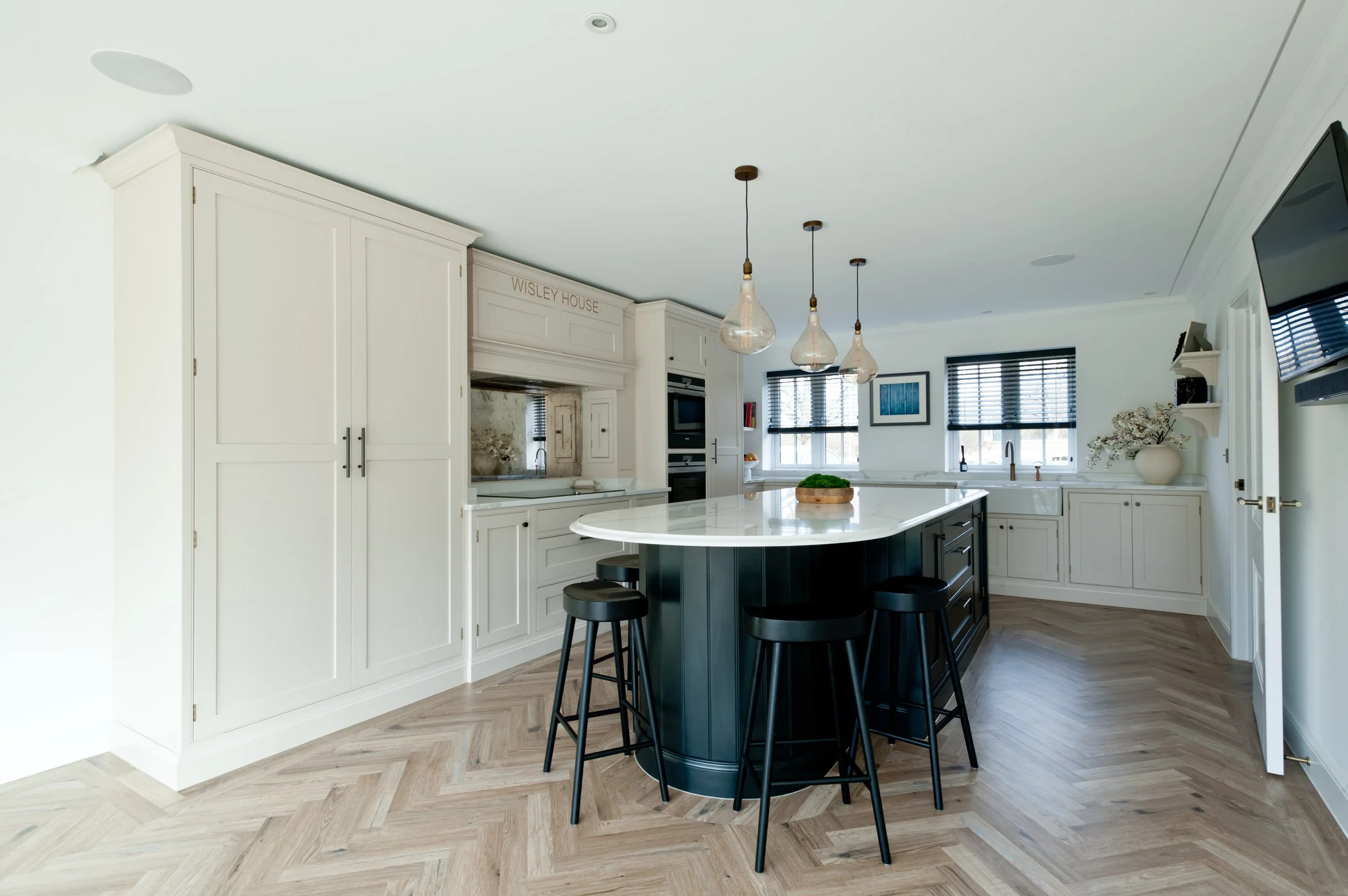 Standing Out from the Crowd: a Dark Painted and Curved Island, Ashford, Kent