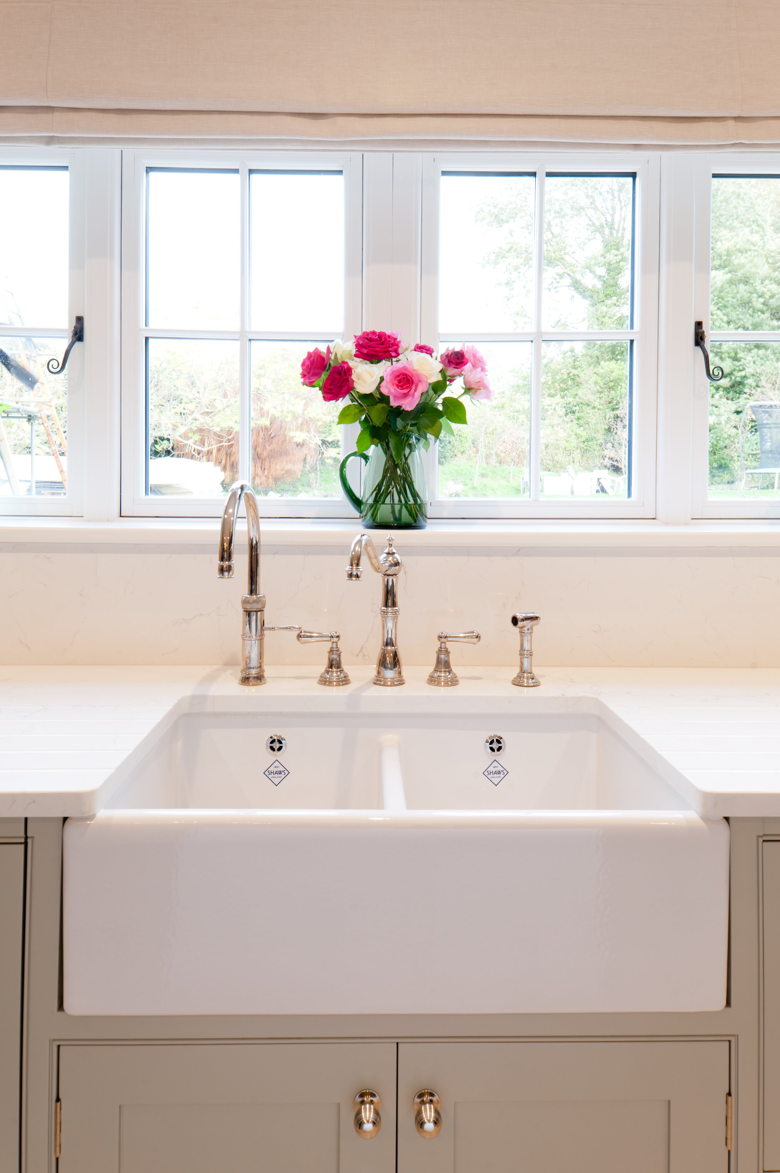 white butler sink in bespoke kitchen